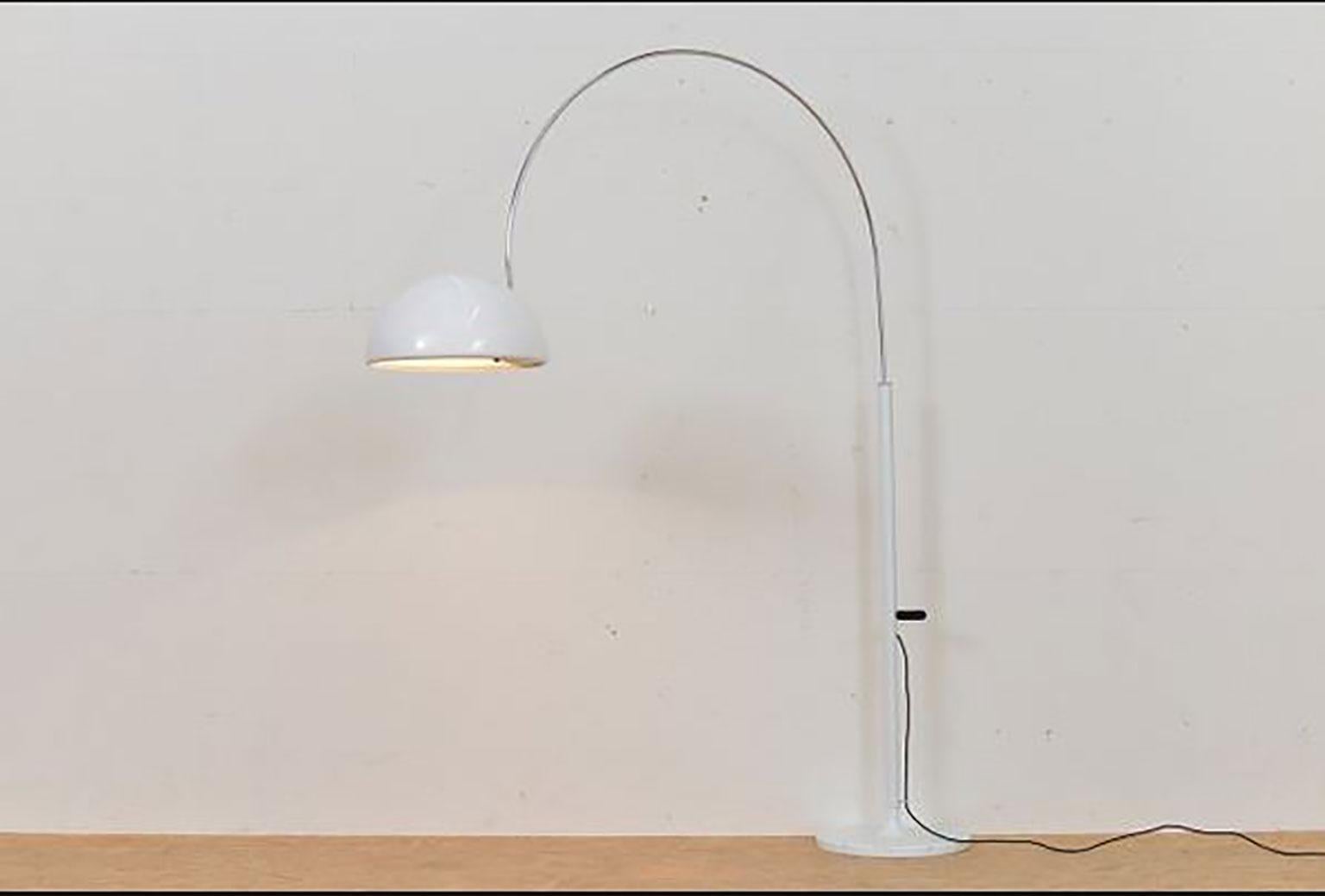 Coupe floor lamp (3320/R) designed by Joe Colombo for Oluce. The Coupe series of lamps is considered as a variation of the spider lamps. The simplistic and artistic mechanism that connects the stem to the head makes it possible to move the direction