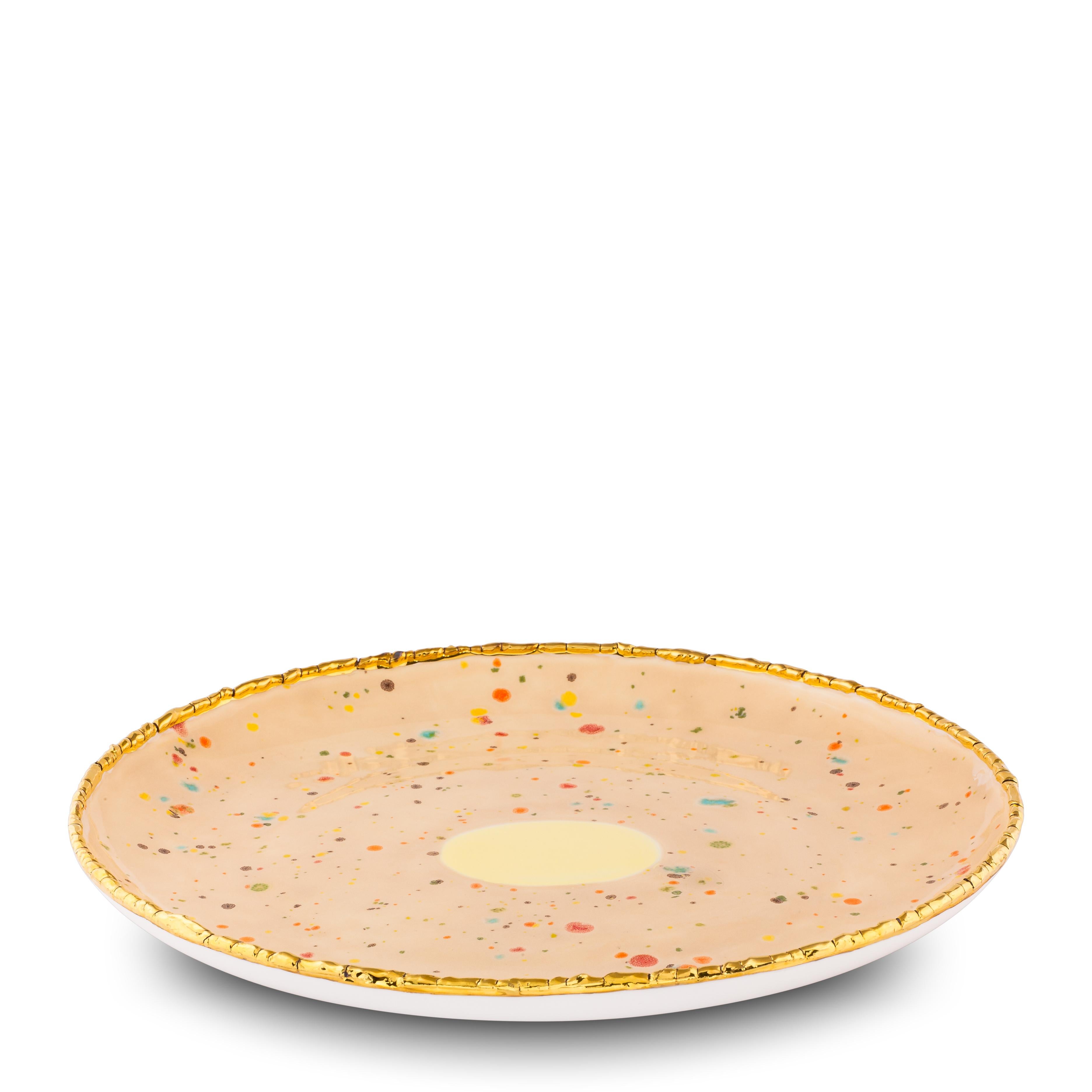 Hand painted in Italy from the finest porcelain, this craquelé edge coupe platter from the Chestnut collection has an original golden crackled rim emphasizing the warm sandy surface covered with little multicolor dots and the bright yellow splotch