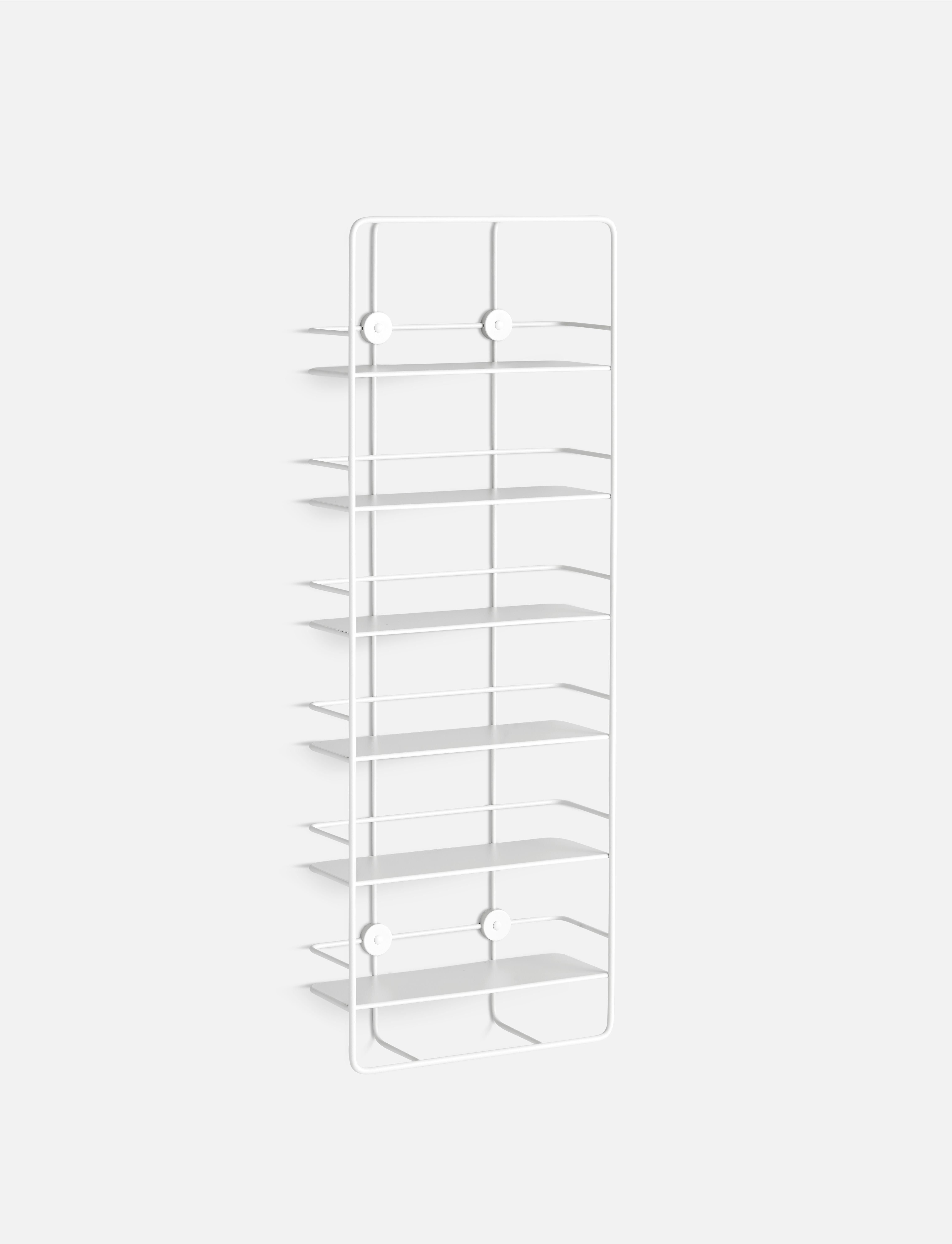 Coupé vertical shelf by Poiat.
Materials: Metal.
Dimensions: D 13.5 x W 37 x H 103 cm.

Poiat is an established architecture and design office based in Helsinki. founded by Antti Rouhunkoski and Timo Mikkonen. The designers met at the University