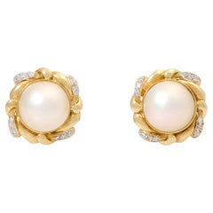Couple earrings with 2 mabpers,