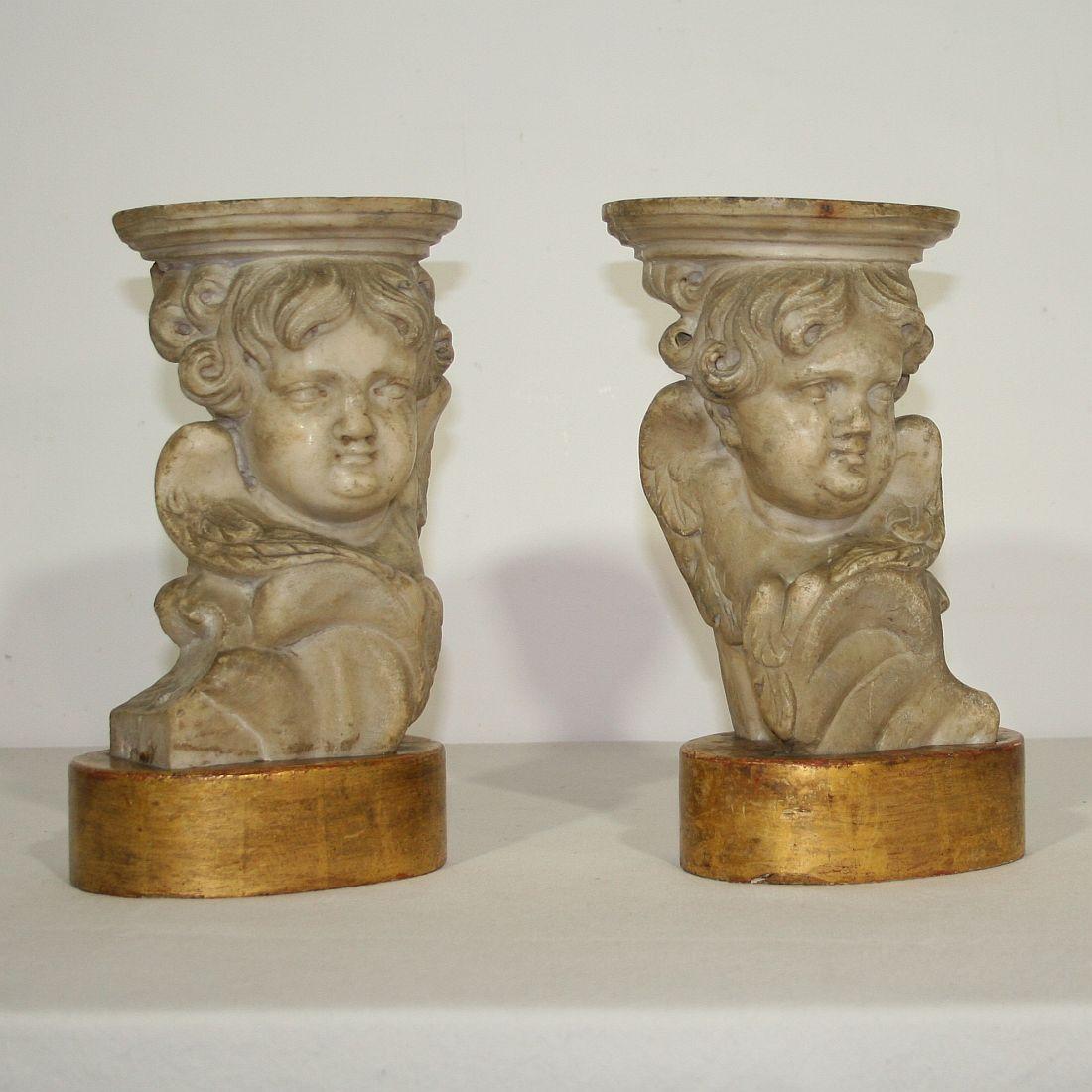 Spectacular and unique couple of 17th-18th century hand carved marble angels once mounted on these giltwood pedestals
Italy, circa 1650-1750.
Weathered, small losses. More pictures are available on request.