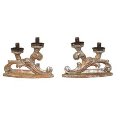 Couple of 18th Century Italian Baroque Carved Wooden And Silvered Candleholders