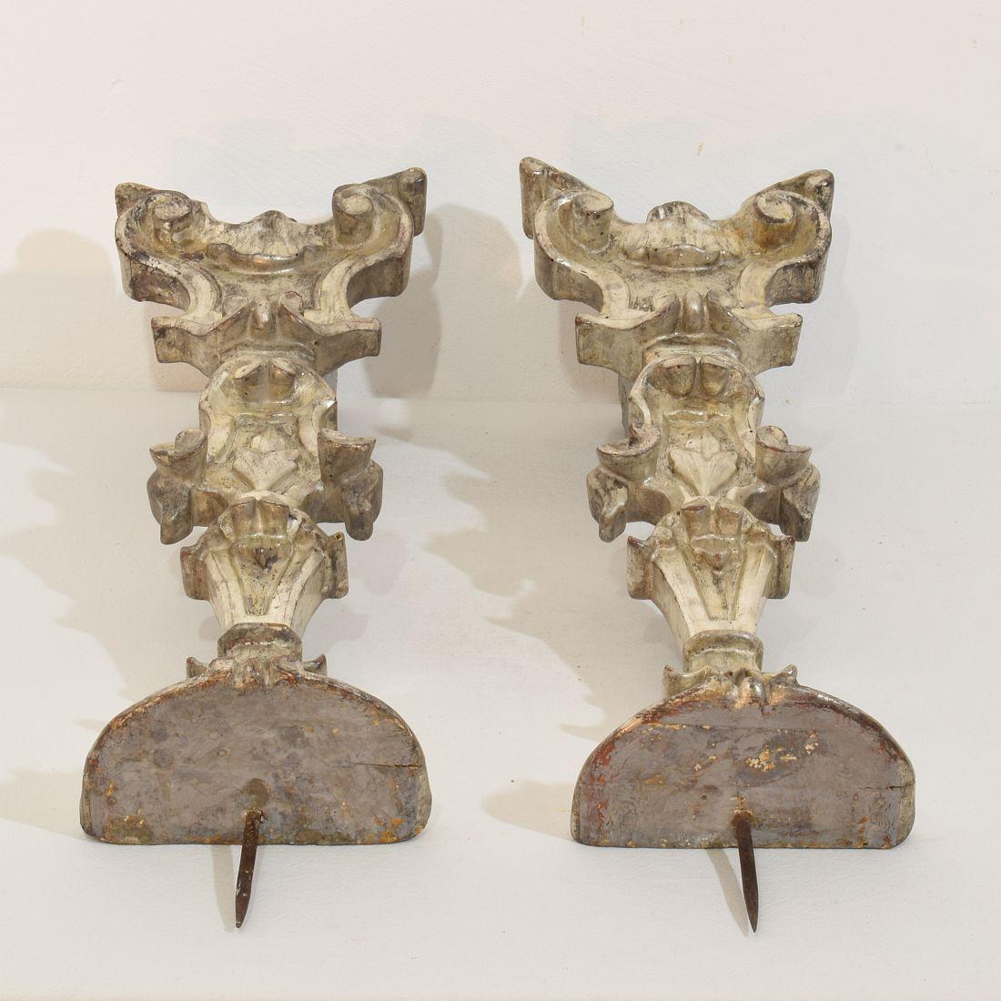 Couple of 18th Century Italian Baroque Carved Wooden And Silvered Candlesticks For Sale 12
