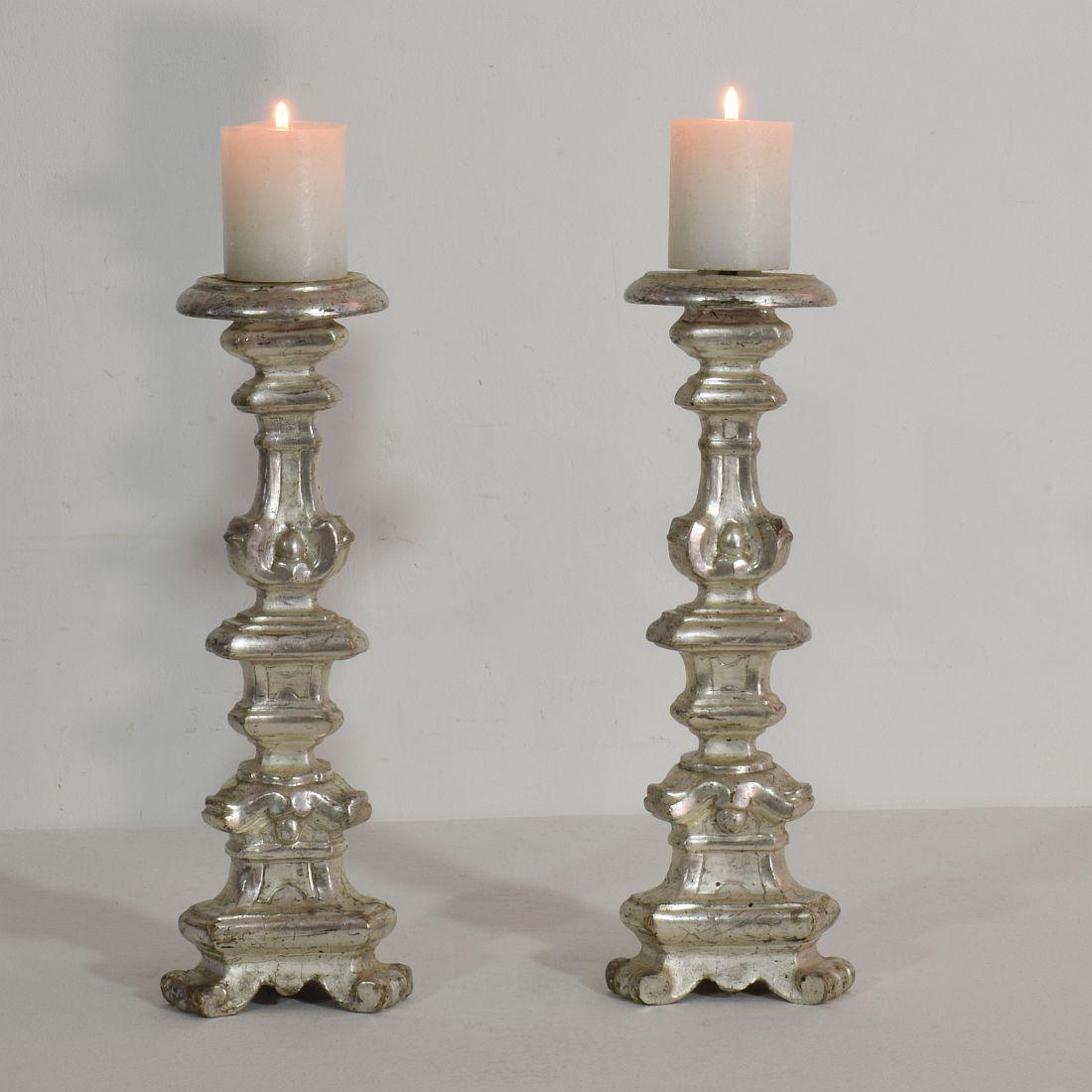 Great pair of carved wooden candleholders with their beautiful silver leaf,
Italy, circa 1750-1800.
Weathered and small losses.