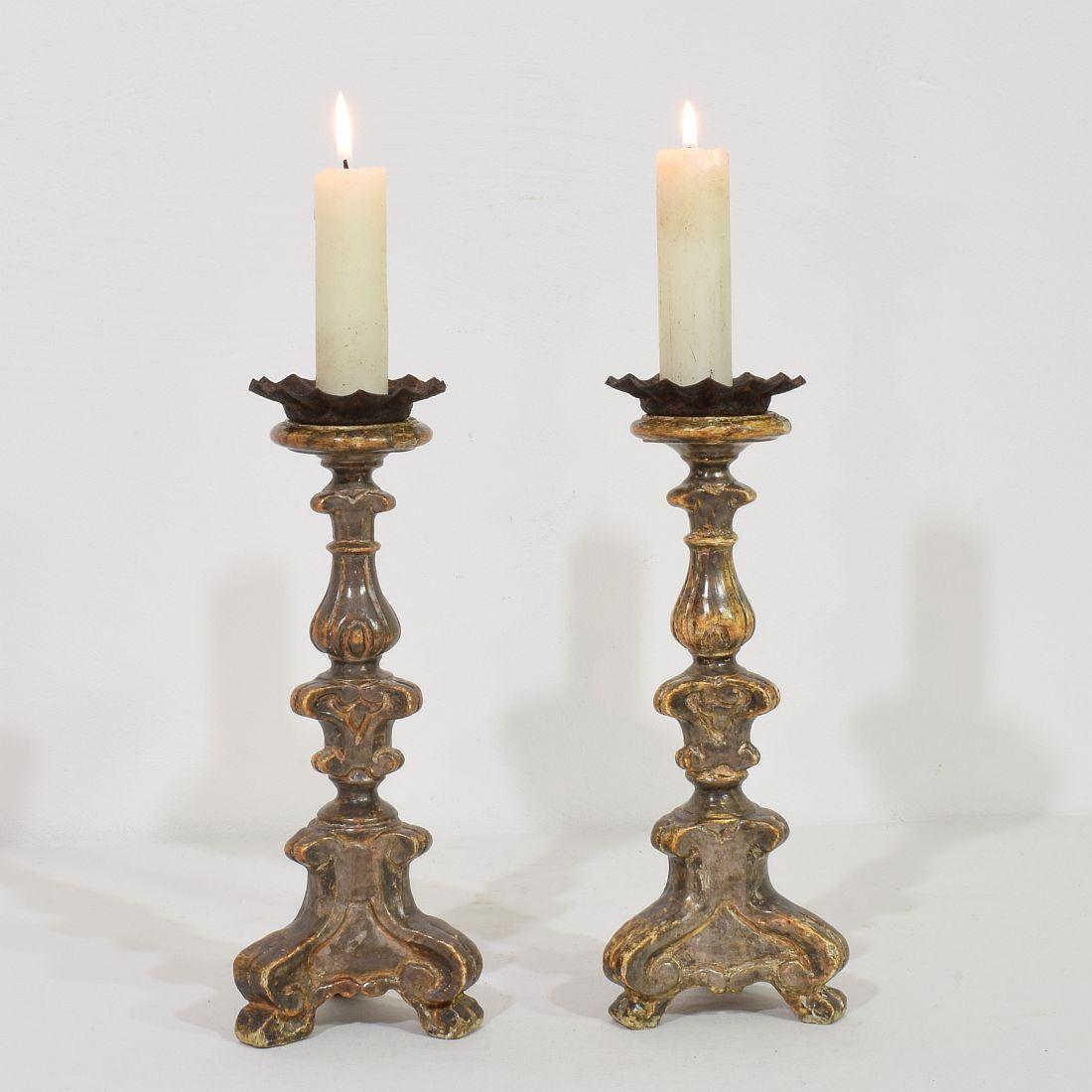 Great pair of carved wooden candleholders with their beautiful weathered silver leaf,
Italy, circa 1750-1800.
Weathered and small losses.