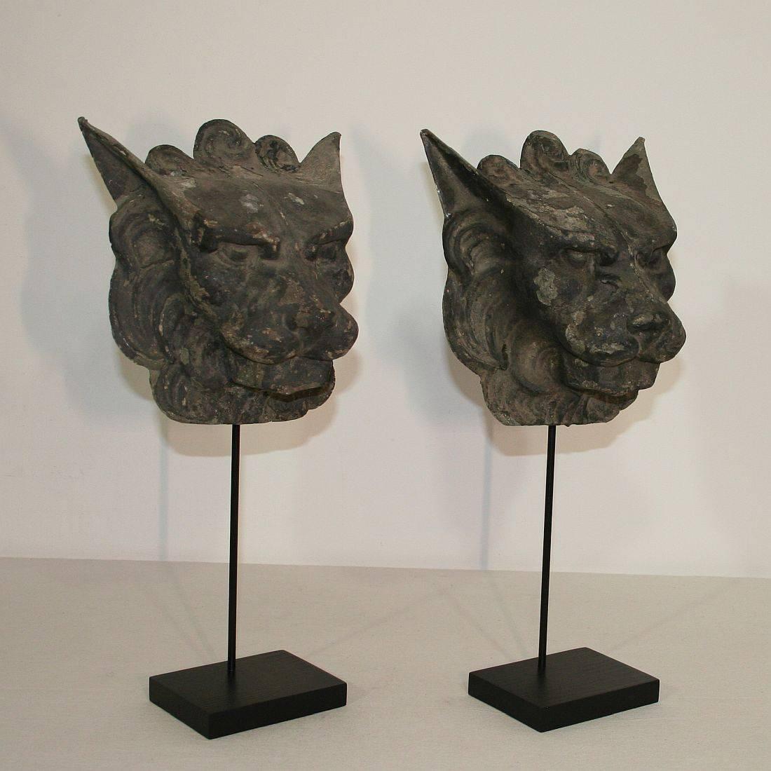 Beautiful and rare French zinc lion Heads, France, circa 1850-1900. Weathered but despite of their age in relative good condition. Measurement with the base.