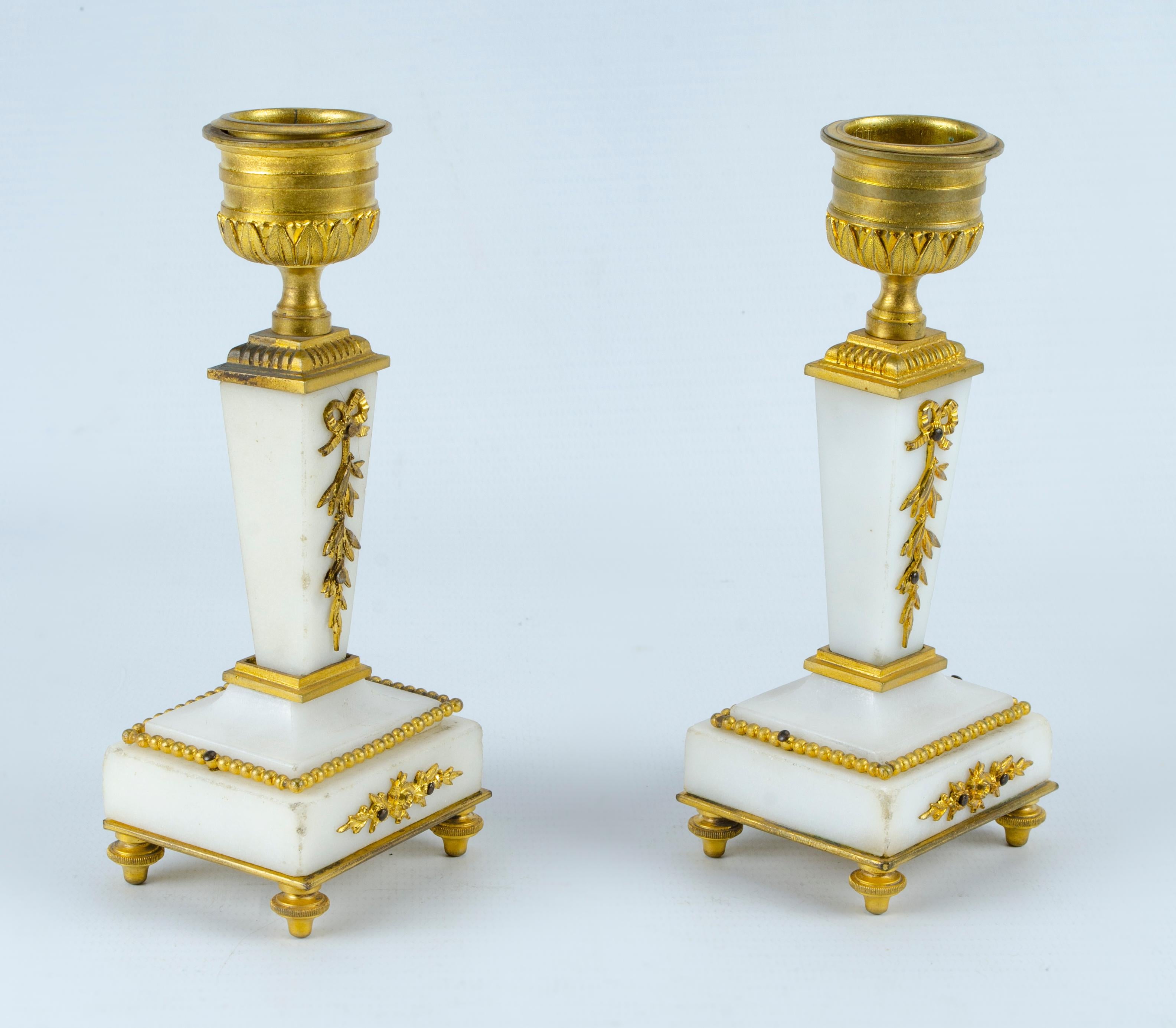 Couple of Candlesticks Style Empire
Empire style
Marble and golden bronze
Origin France circa 1900
Very good condition. Natural wear.