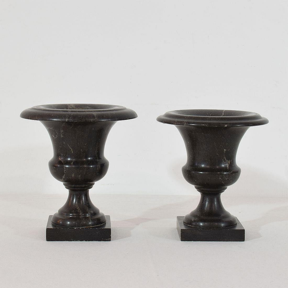 Rare black marble vases. Beautiful decorative centrepieces.
France, circa 1800-1850.
Weathered, small losses and old repair.










  