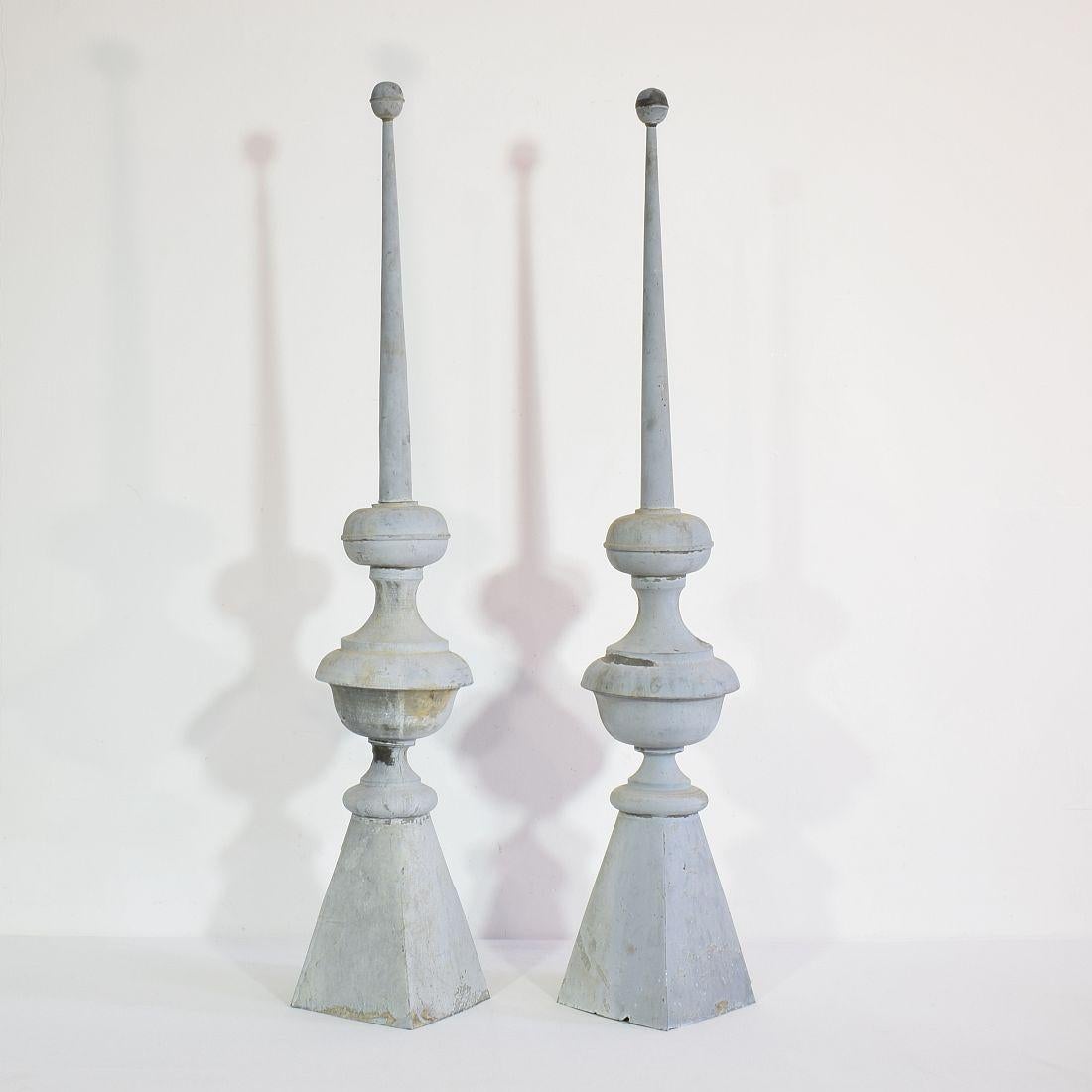 Great and rare couple of zinc finials, France circa 1850-1900. Weathered, small losses and old repairs.
