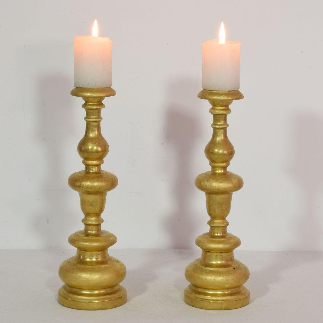 Beautiful pair of Baroque giltwood candleholders.
Unique and original period pieces, Italy, circa 1750.
good condition. Measurements include the hand forged iron peak.