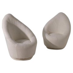 Couple of leaf-shaped French Bouclé Armchairs