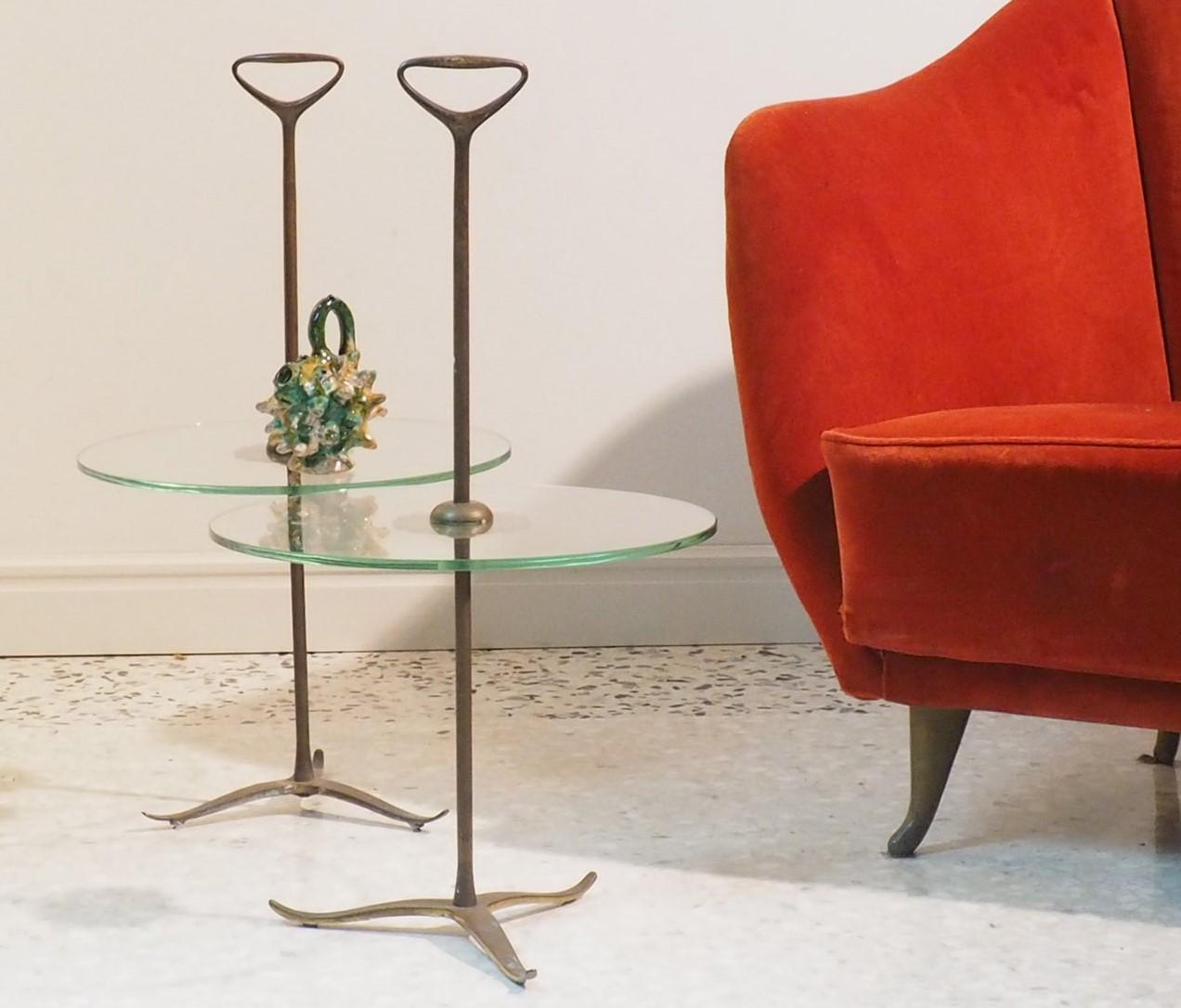 Pair of rare side table designed by architect Cesare Lacca, with brass handle and original Verde Nilo glass top. Original Patina that can be polished.
An elegant item perfect as side tables as nightstands.
Born in Naples in 1929, the Italian