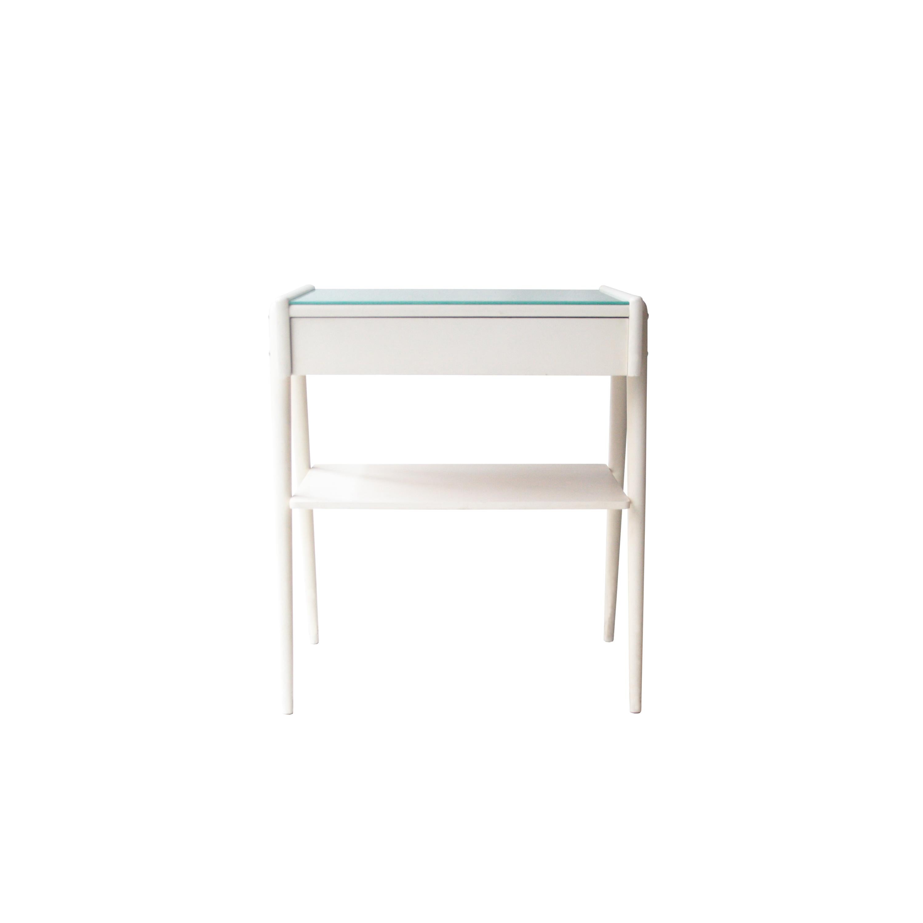 Pair of bedside tables in white lacquered wood with glass top in lacobel in water green color.