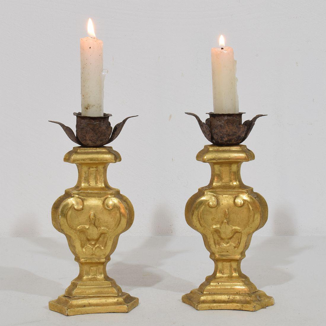 Great pair of small wooden candleholders with their original gilding.
Very nice type candleholder and rare to find in a pair.
Italy, circa 1780-1800.
Weathered, small losses.