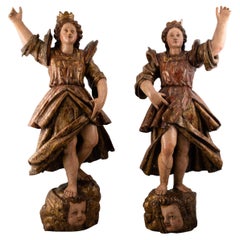 Couple of torchero angels. Carved and polychrome wood. Spanish school, 17th c.