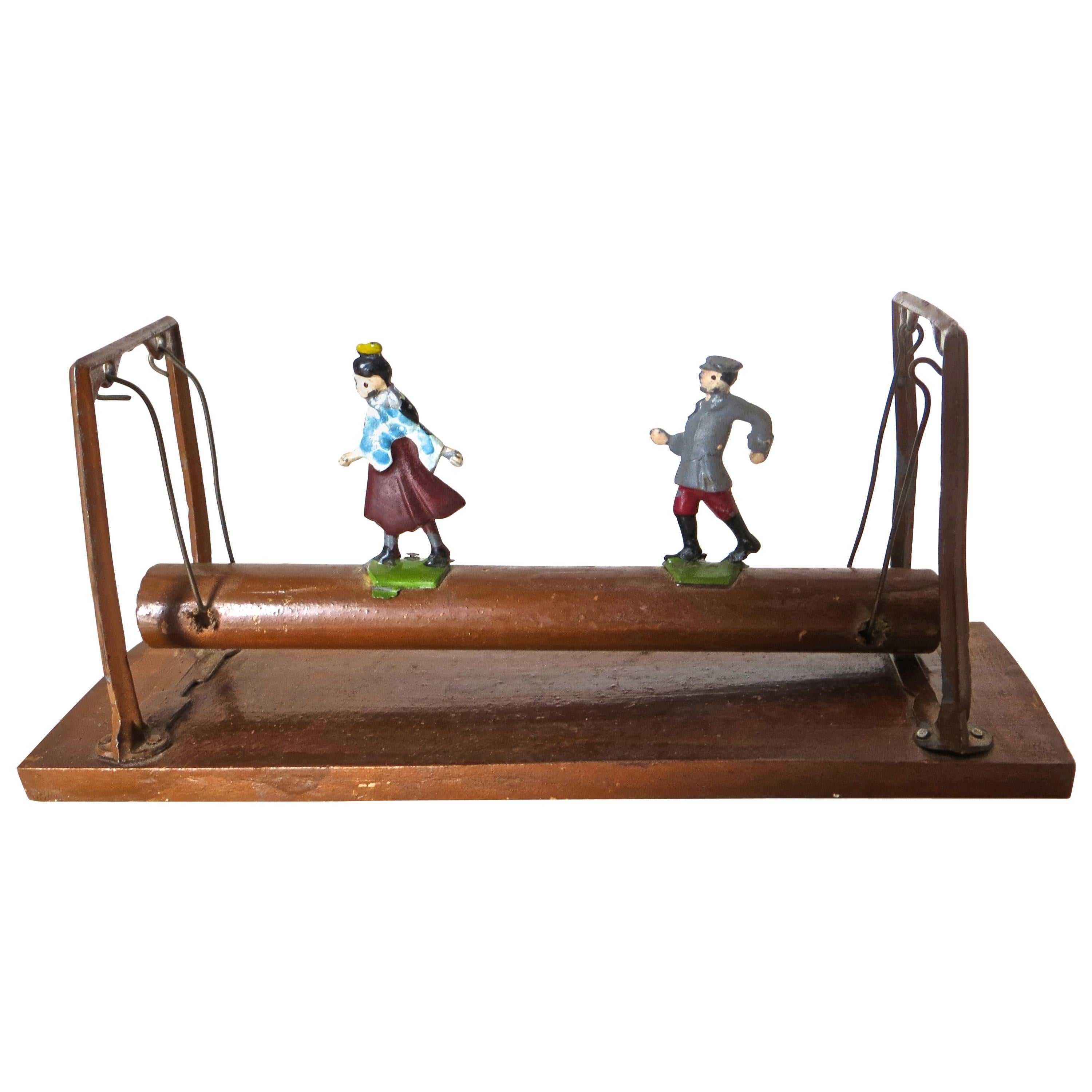 "Couple on a Log" Toy,  French, circa 1930