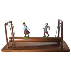 Vintage "Couple on a Log" Toy,  French, circa 1930