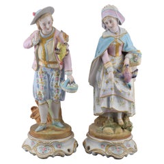 Antique Couple with birds, Meissen style. Biscuit. Samson & Co., France, 20th century.
