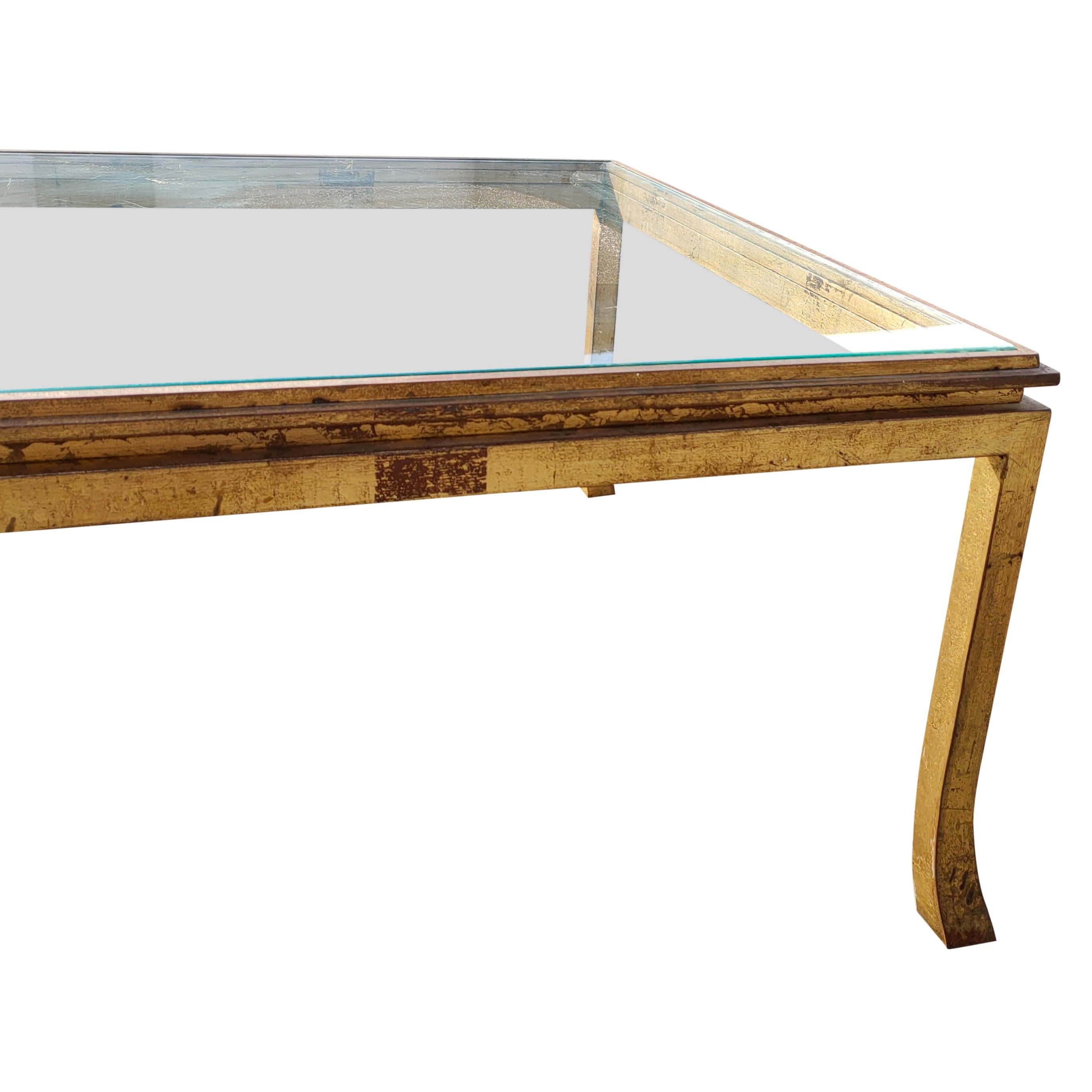 Late 1960s solid iron table for Maison Ramsay France
gold leaf over Ramsay signature red patina
in good vintage condition
some superficial areas of minor fading on gold leaf
the table will ship without the glass top
bespoke glass top can be