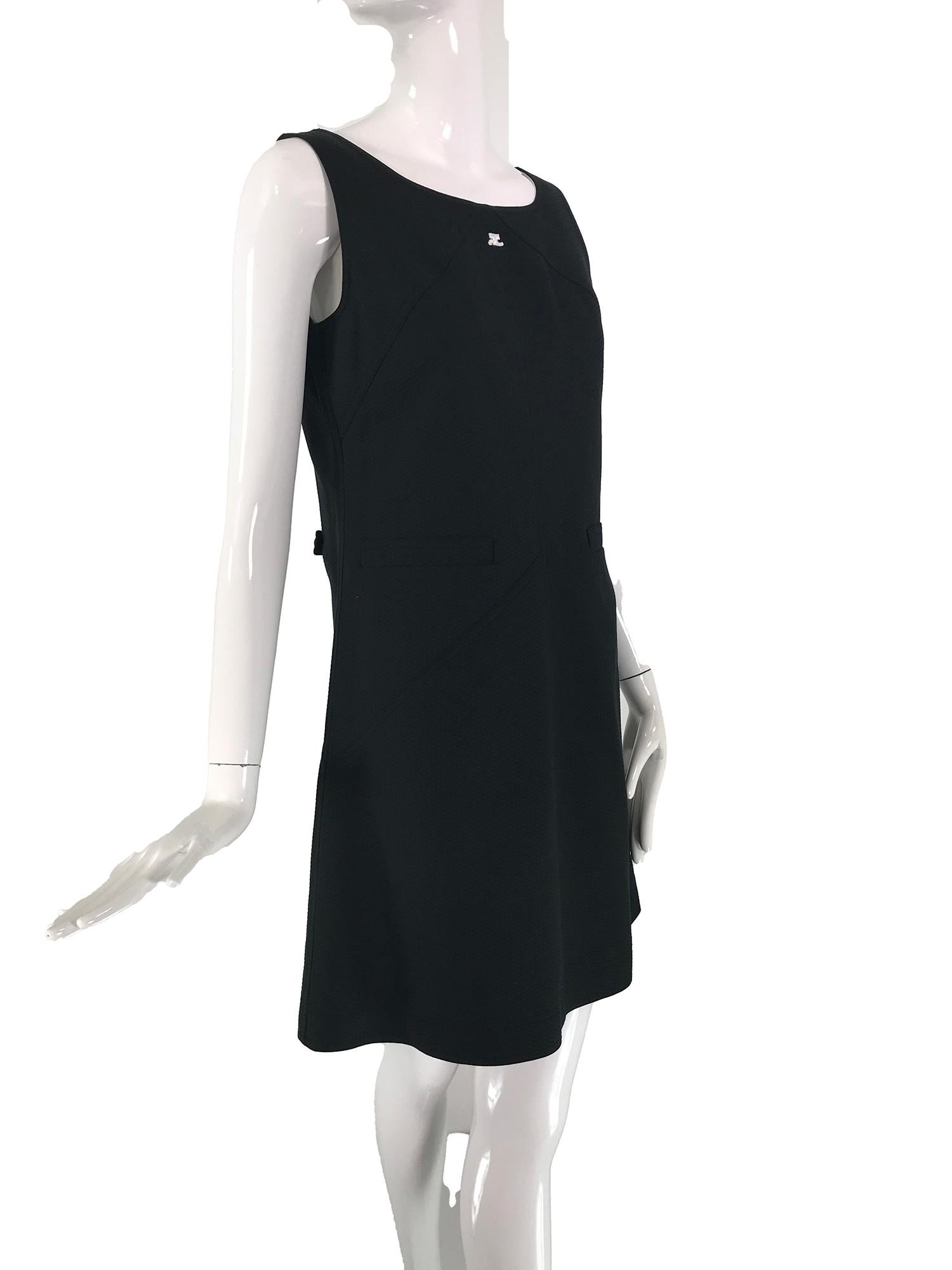 Courreges 100% black diamond design cotton A line sleeveless shift dress unworn with Bergdorf Goodmans tag, marked size 40. Classic Courreges style A line dress pieced and seamed, beasom hip front pockets (unpicked). The dress closes at the side