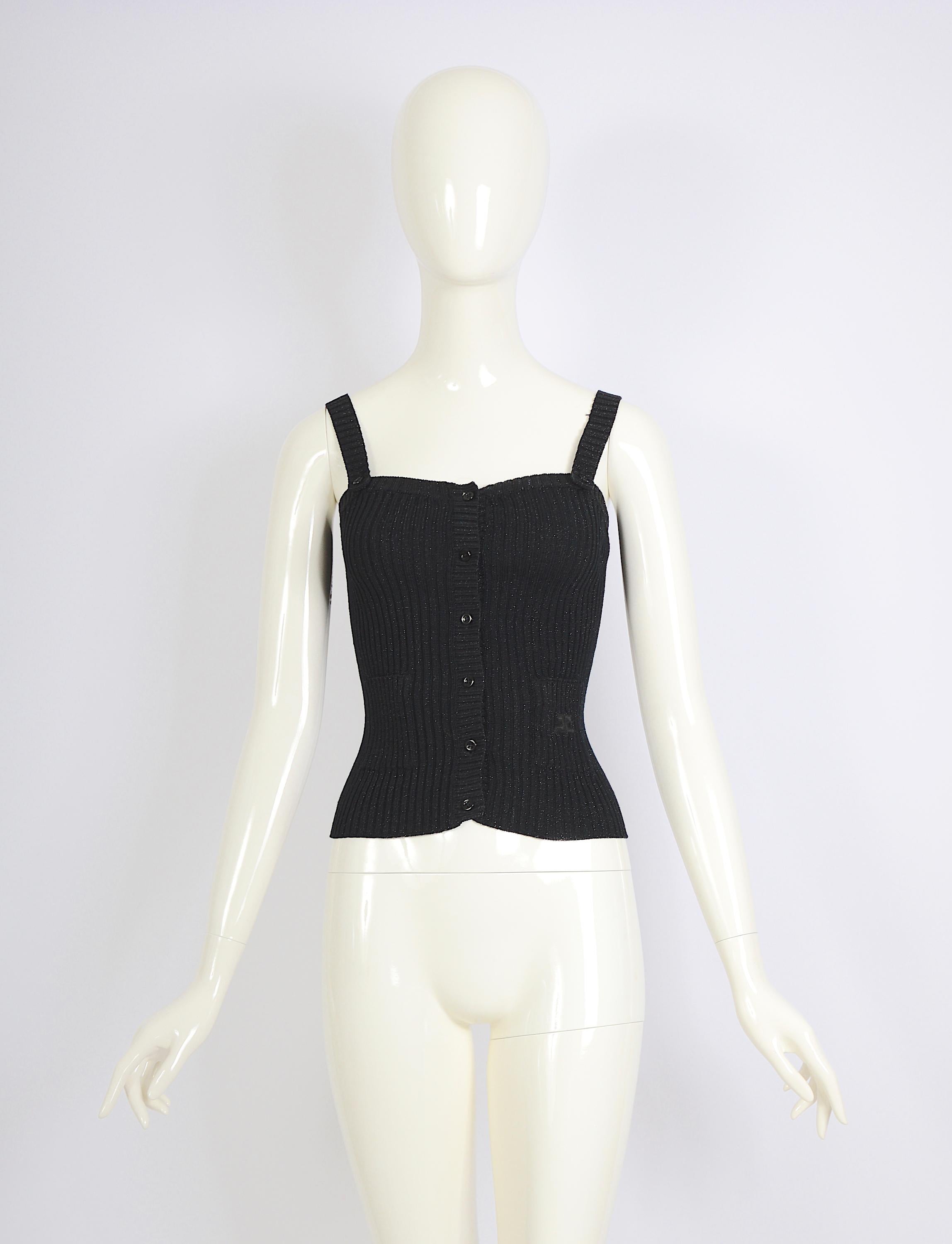 Vintage Courrèges Paris 1960s black cotton and lurex stretch top with front button closure and shoulder straps top.
Courrèges size B
Measurements flat: Bust 12,5inch32cm(x2) - Waist 12inch/30,5cm(x2) - Total Length 18,5inch/48cm
Excellent condition.