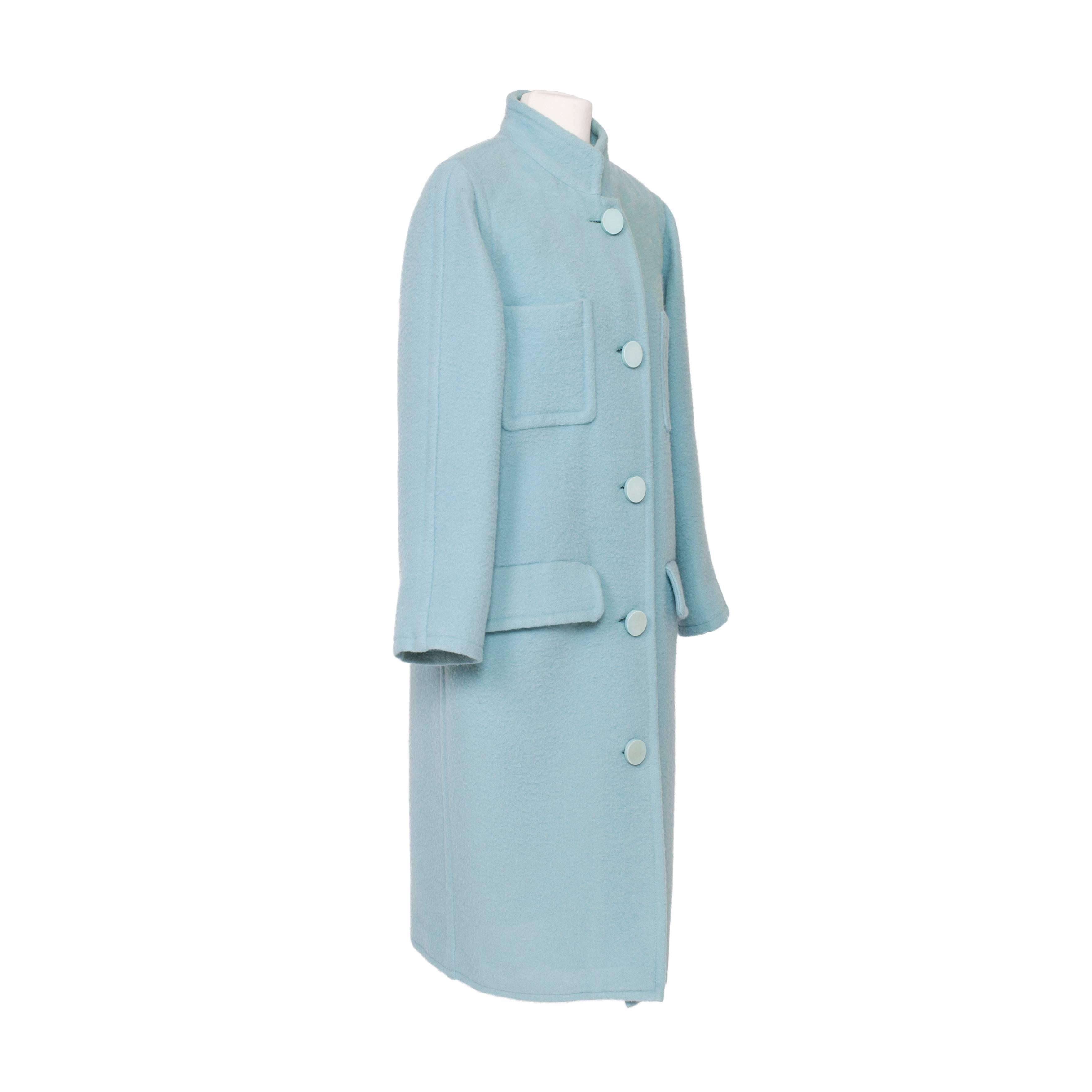 Courreges Baby Blue Wool Coat from 1970's. This iconic coat featuring oversized patch pockets and sewn in pockets with flap with center front button closure, fully lined.
Made in France. 
Original size :  French 34 (Fits like US 6 - 8,