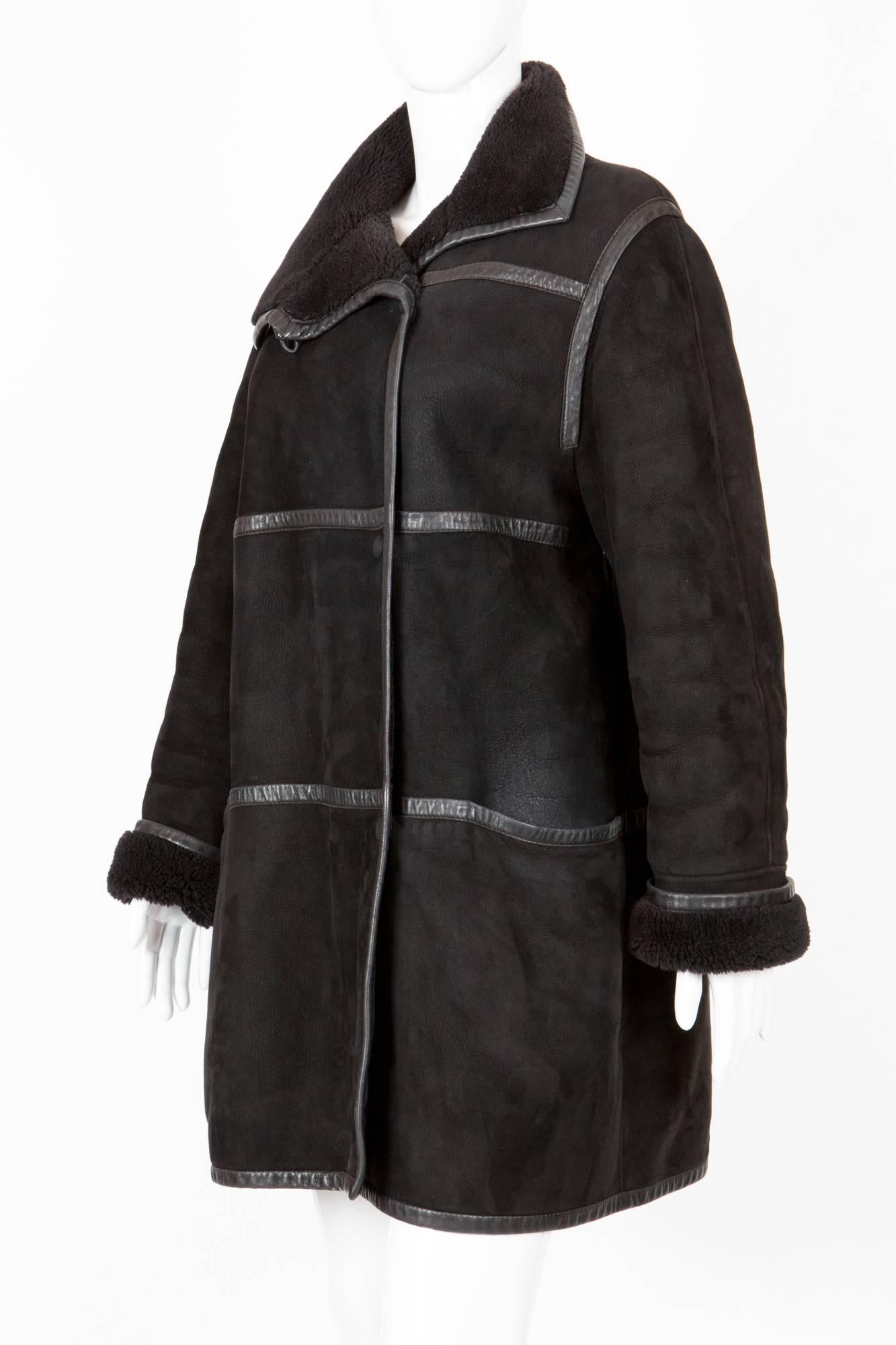 1980s gorgeous Courrèges 100% black calf leather shearling coat featuring black leather straps,snaps front opening, pockets in bands. 
In good vintage condition. Made in France. 
Estimated size Medium - 38fr/US6 /UK10 and 40fr/US8/UK12
We guarantee