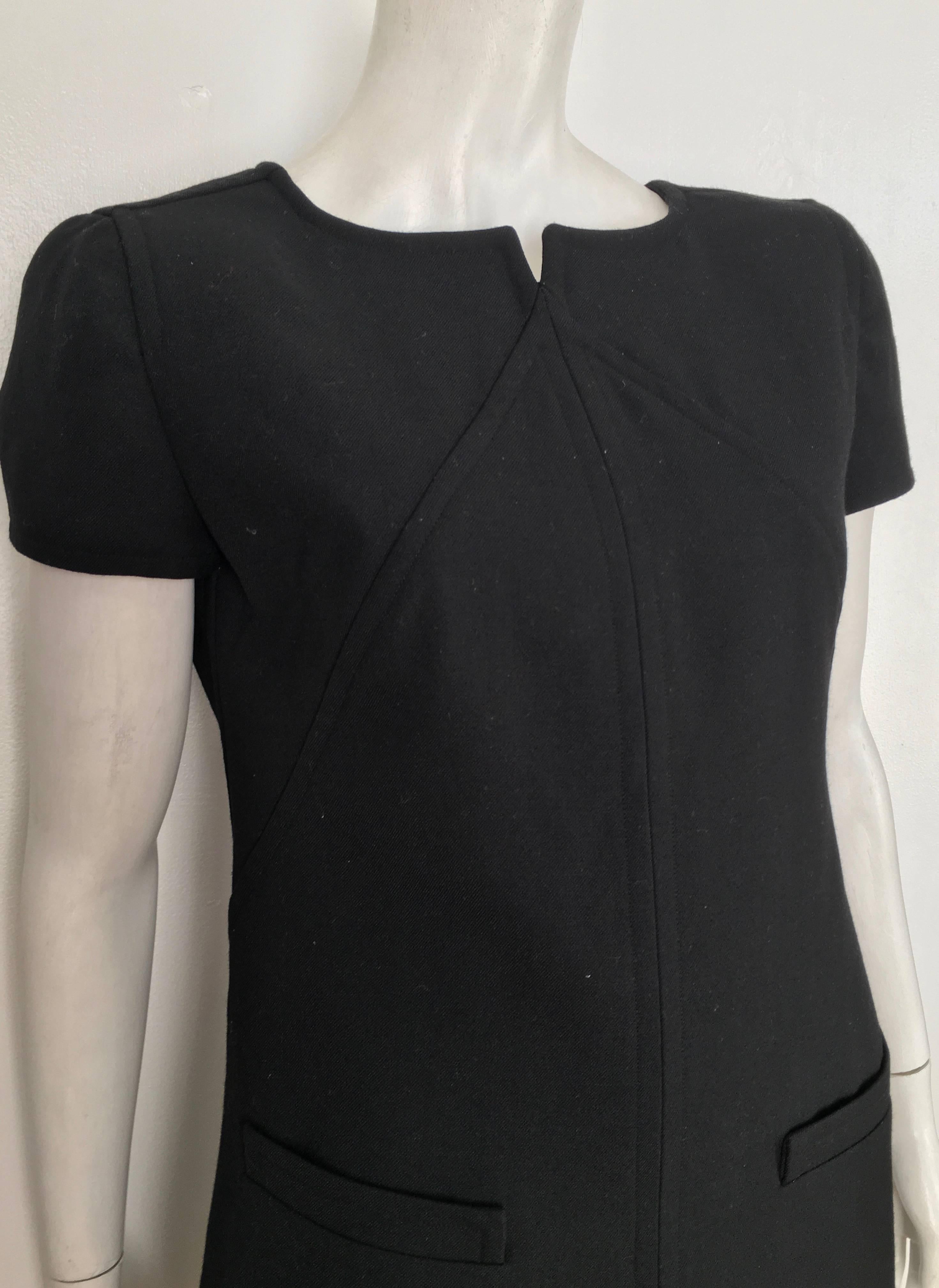 Courreges Black Wool Short Sleeve Dress with Pockets Size 8. In Excellent Condition In Atlanta, GA
