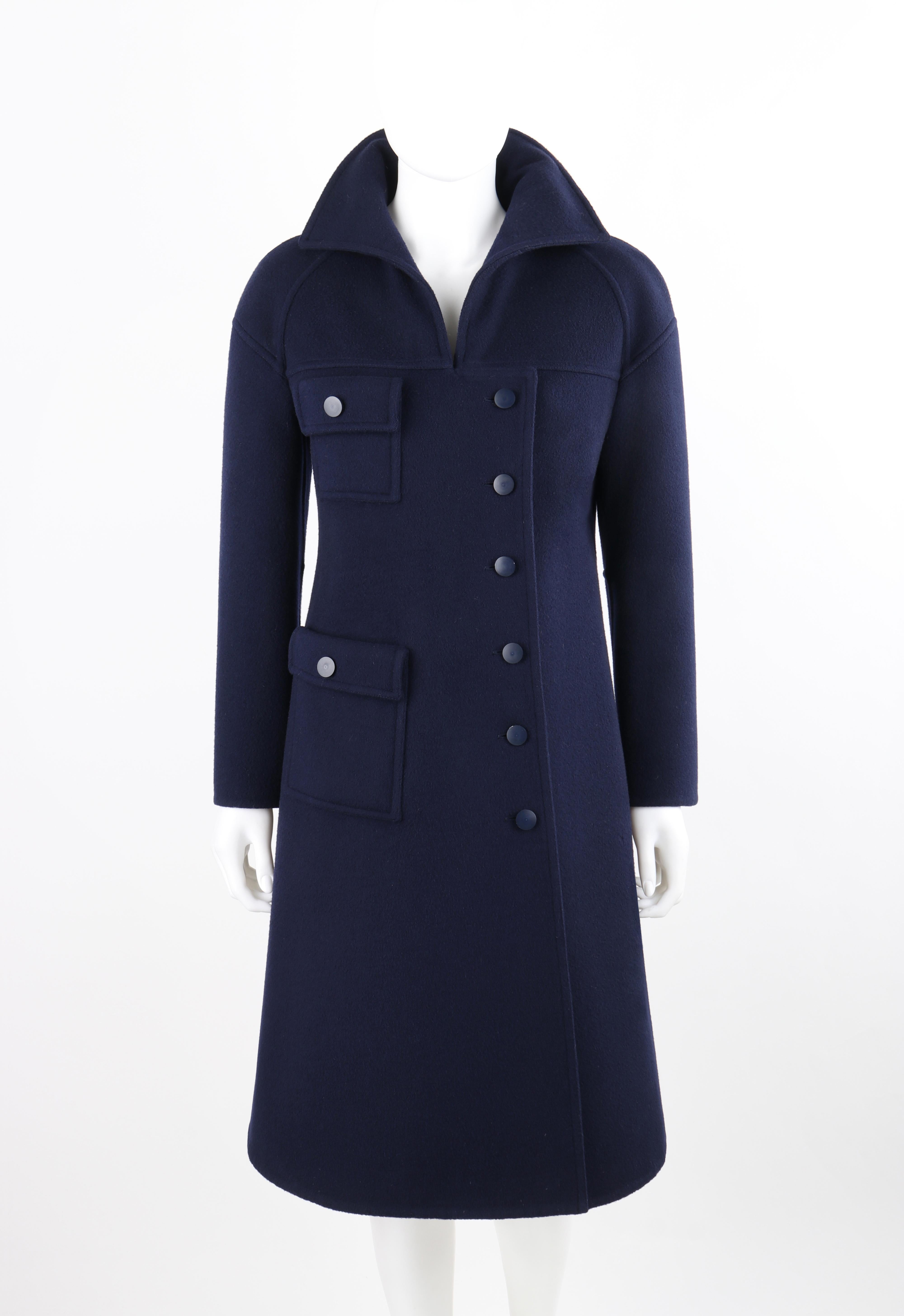 COURREGES c.1970's Couture Future Marine Navy Button Front Coat Overcoat

Brand / Manufacturer: Courreges
Circa: 1970's
Label(s): Courreges 'Couture Future' - numbered (055697) / L. Magnin & Co.
Designer: Andre Courreges
Style: Overcoat 
Color(s):