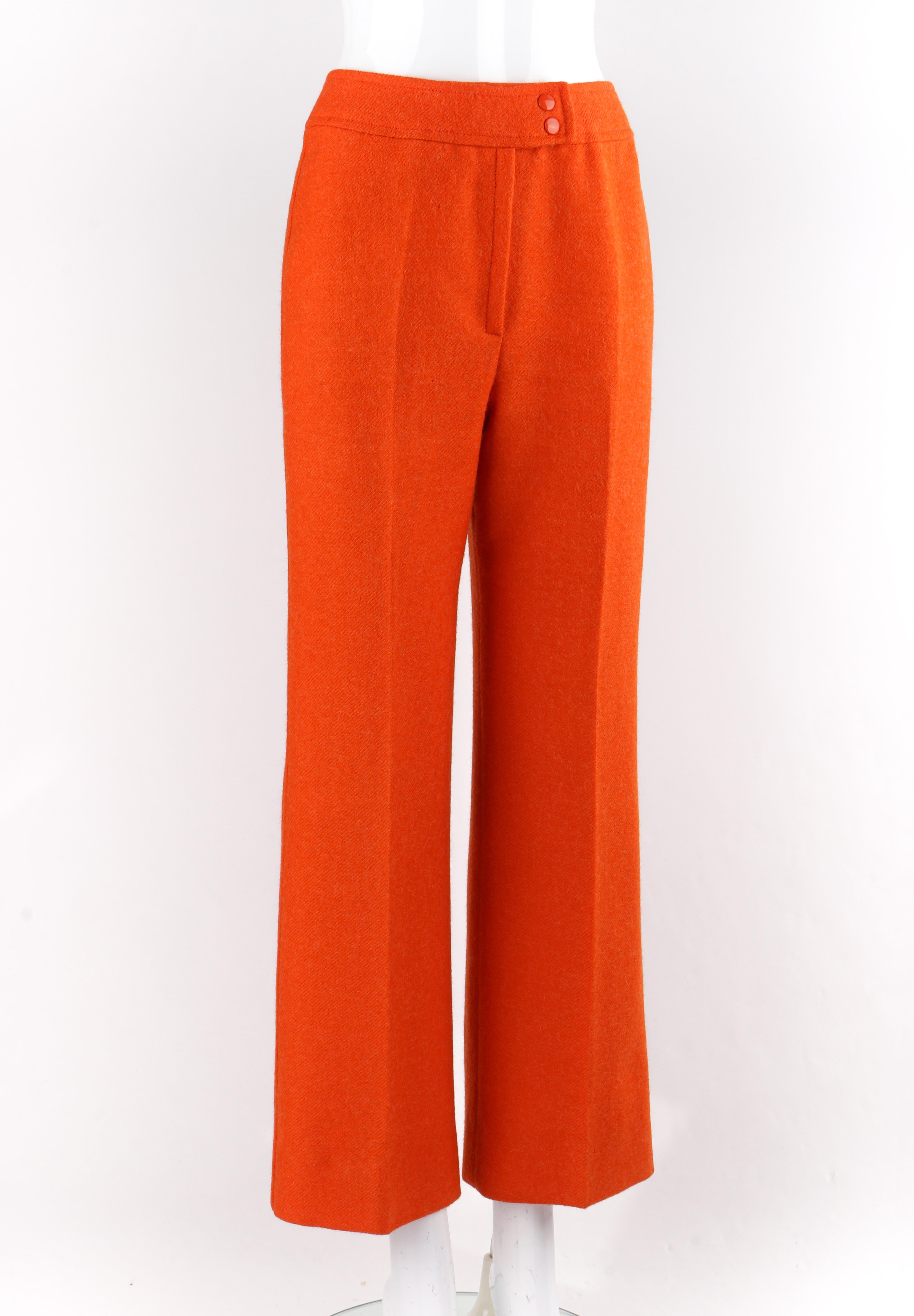 COURREGES c.1970’s Hyperbole Bright Orange High Rise Wide Leg Trouser Pants
Circa: 1970’s
Label(s): Courreges Paris Hyperbole
Designer: Andre Courreges
Style: Wide leg high rise trouser pants
Color(s): Orange
Lined: Yes
Unmarked Fabric Content (feel