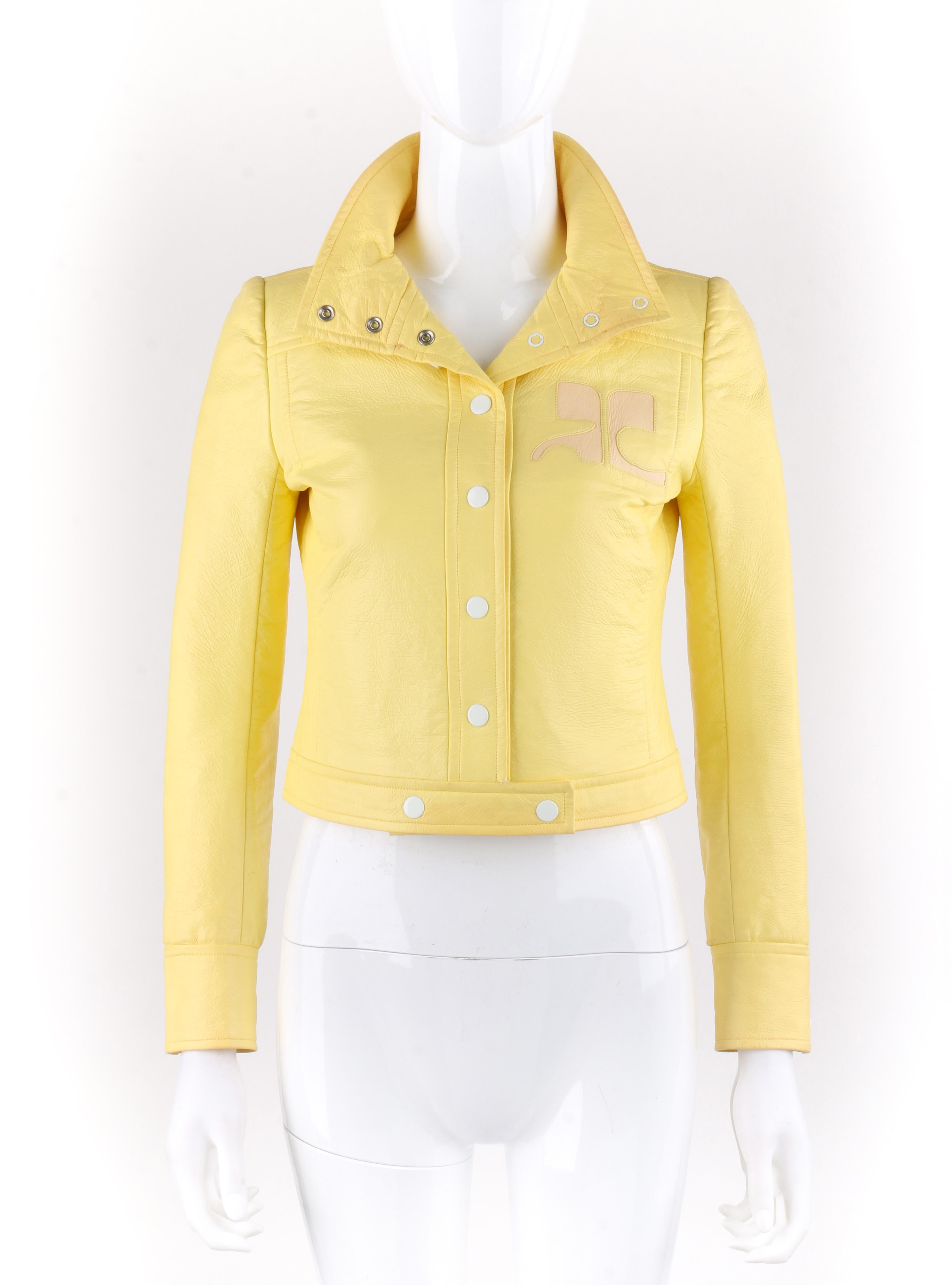 DESCRIPTION: COURREGES c.1970's Icterine Yellow Vinyl Mod Signature Logo Cropped Jacket

Circa: c.1970’s
Label(s): Courreges Paris
Designer: Andre Courreges
Style: Cropped jacket
Color(s): Shades of icterine yellow and beige
Lined: Yes
Marked Fabric