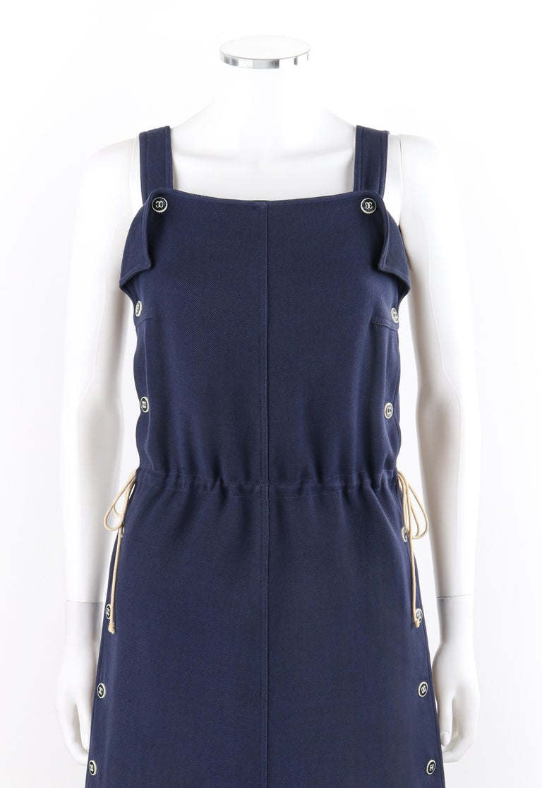 COURREGES c.1970's Navy Blue Button Up Tie Cinch Waist Sleeveless Jumper  Dress For Sale at 1stDibs | 1970s jumper dress, navy sleeveless jumper,  blue button dress