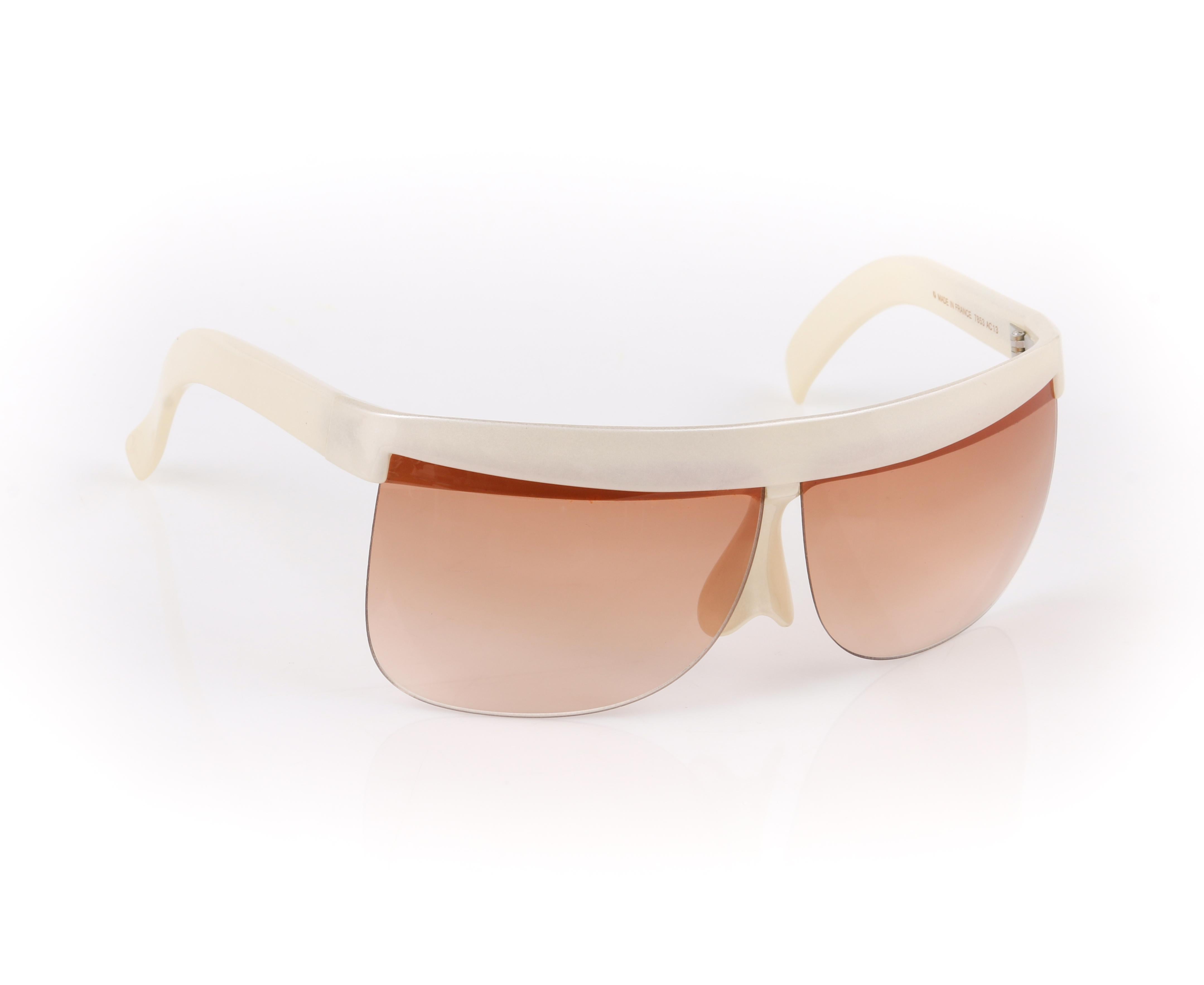 white plastic sunglasses