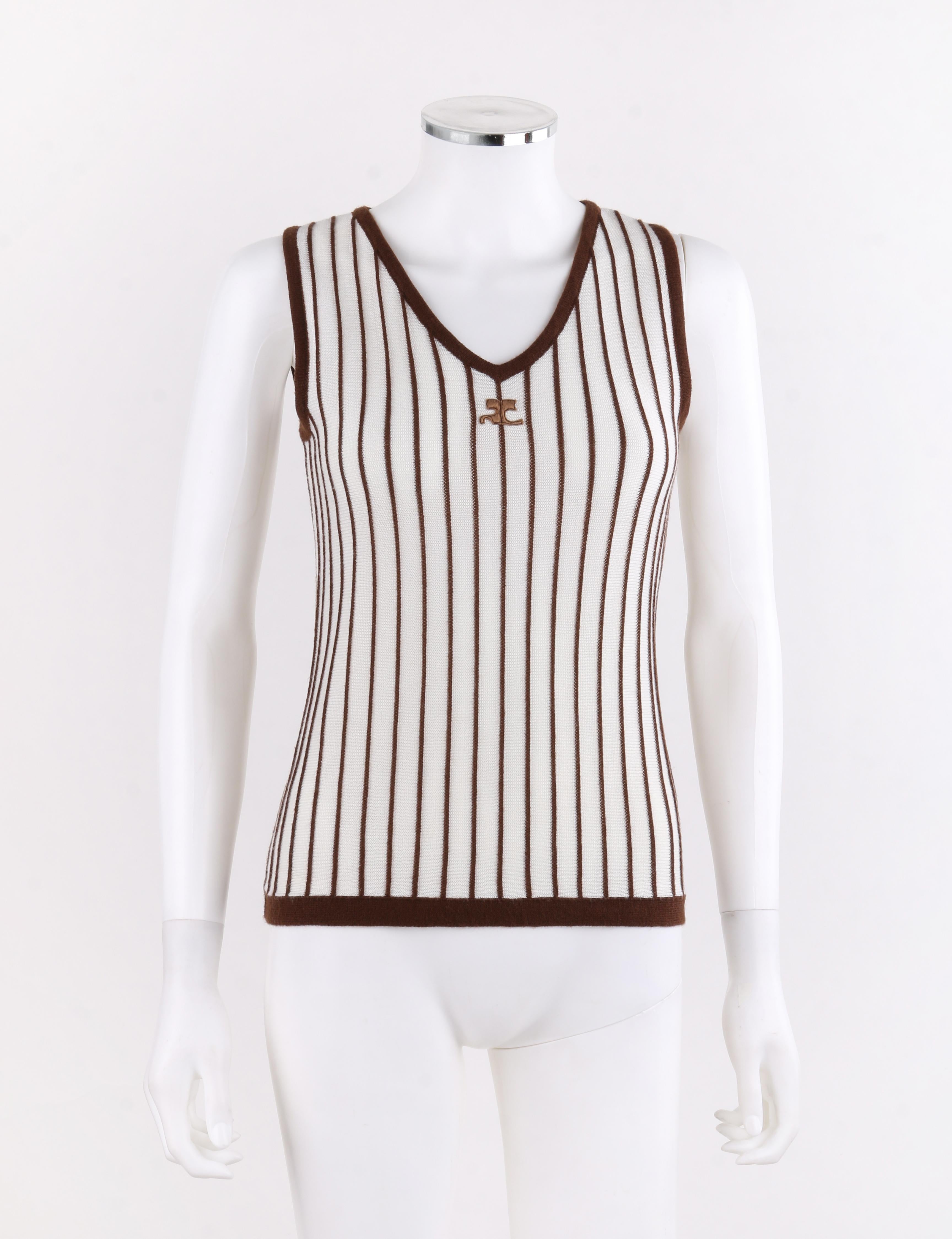 COURREGES c.1970's Sleeveless V-Neck Striped Knit Sweater Vest Tank Top
 
Circa: 1970’s
Label(s): Courreges Paris
Designer: Andre Courreges
Style: Sweater vest
Color(s): Beige, brown
Lined: No
Marked Fabric Content: “100% acrylic”
Additional Details
