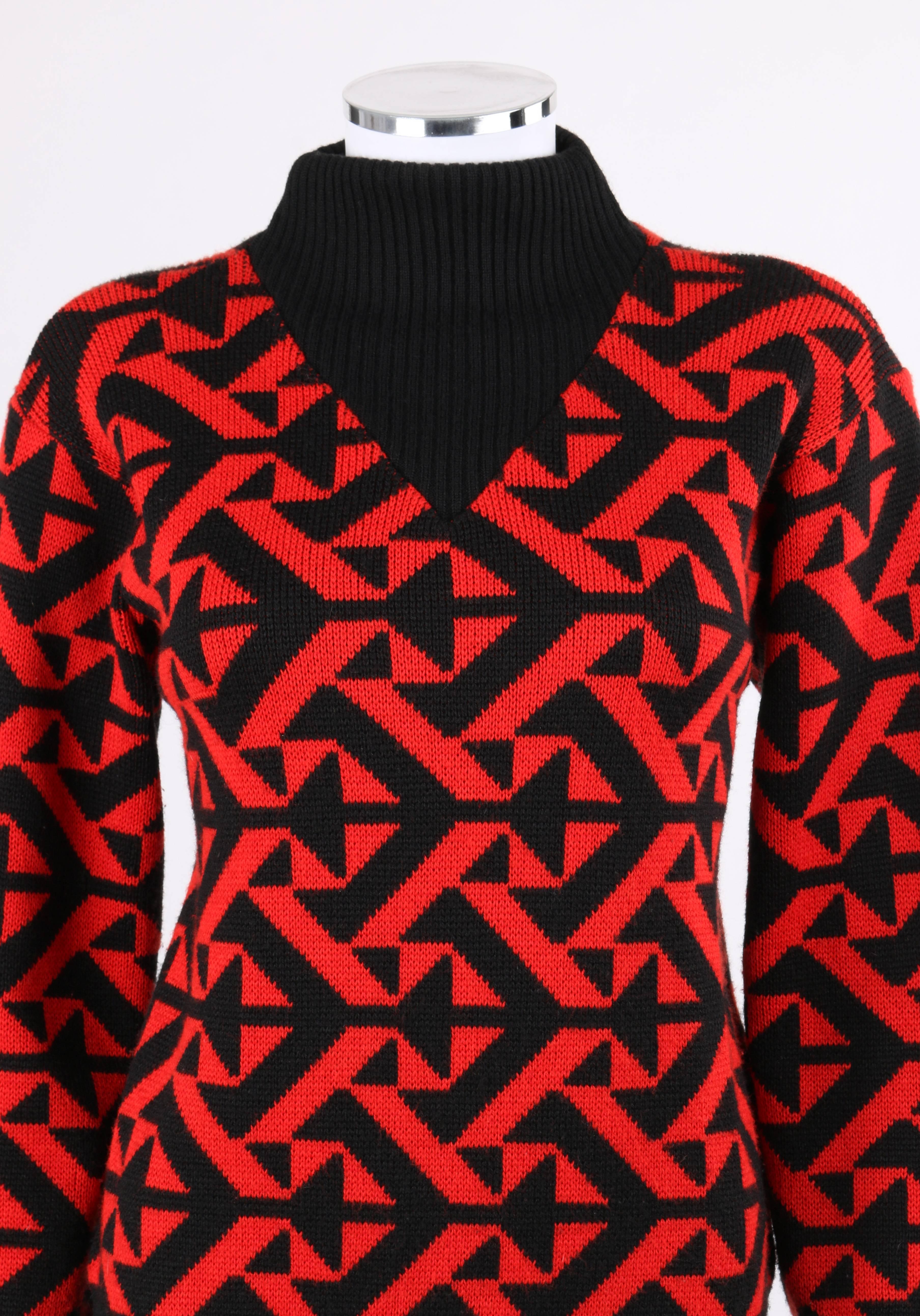 Vintage Courreges c.1980's red and black geometric op art wool knit sweater. Designed by Andre Courreges. Black and red geometric op art pattern wool knit. Long sleeves. Drop shoulder. Mock neck with v inset at front. Rib knit detail at collar,