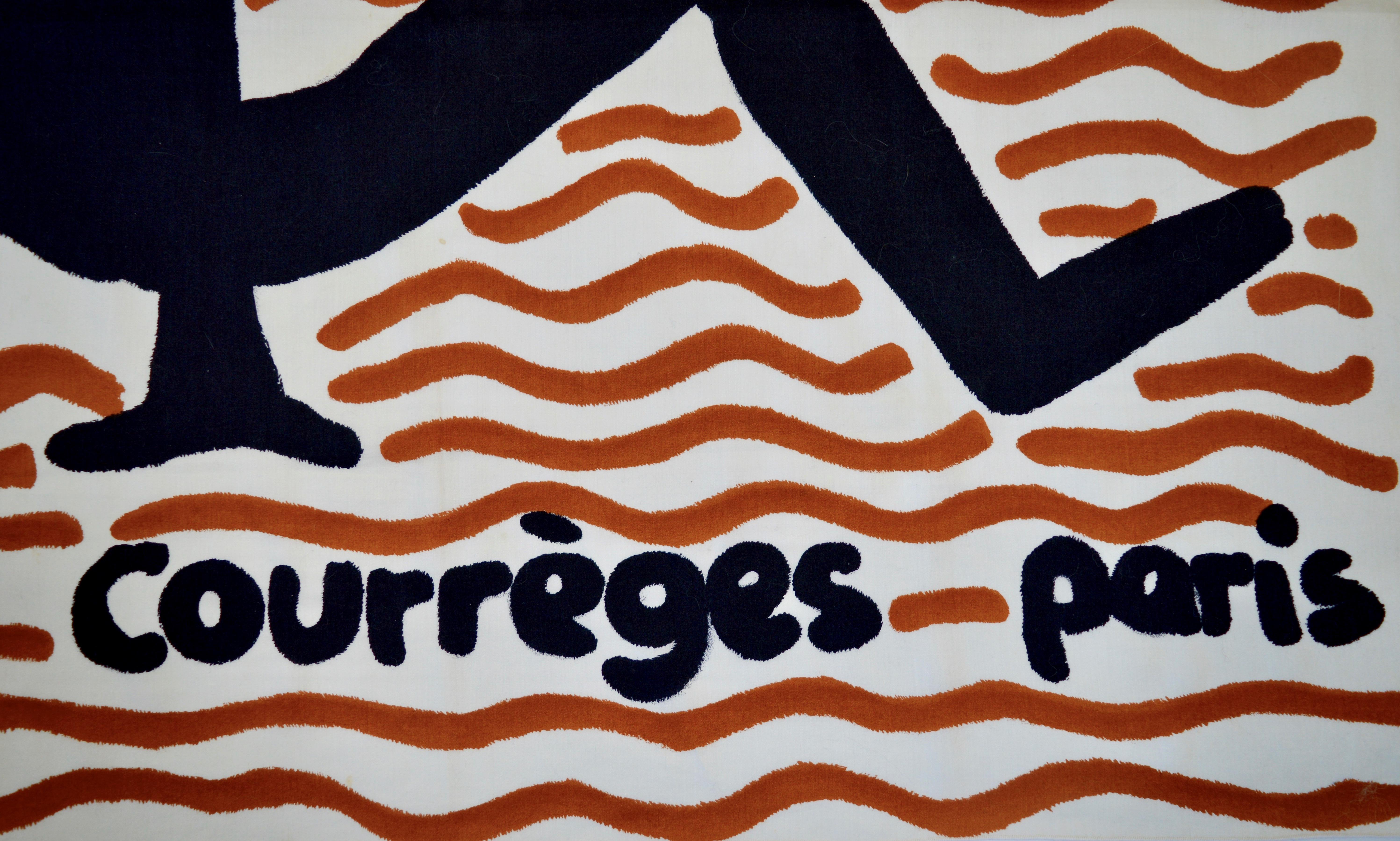A rare graphic Courrèges scarf from the early 1970's of a playfully reclining girl on a beach, evocative of the bygone days of the French Riviera.
Printed on fine cotton and finished with an overlocked machine edge. 
