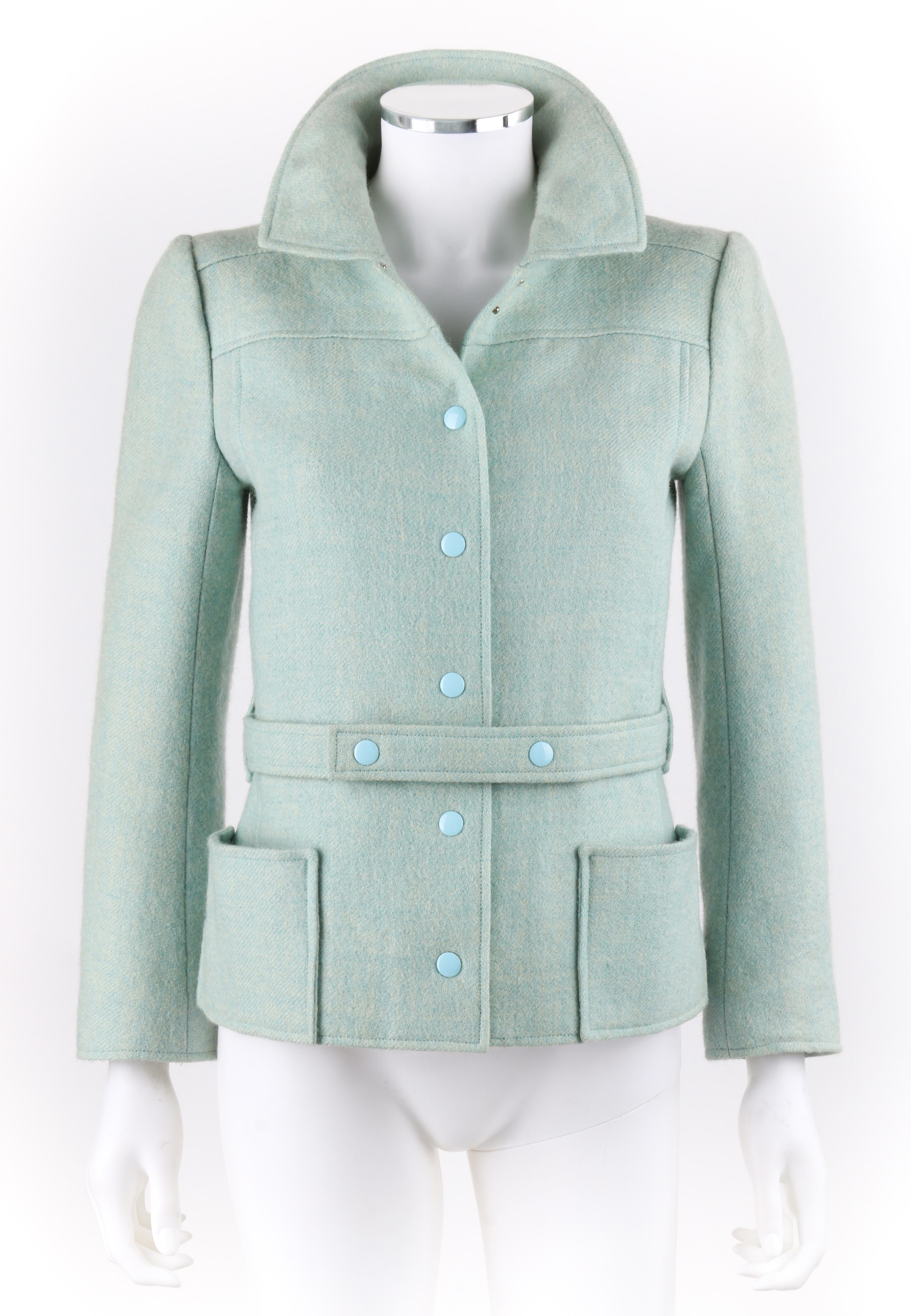 DESCRIPTION: COURREGES Hyperbole c.1970's Sky / Mint Blue Snap Front Belted Jacket
 
Circa: c.1970’s
Label(s): Courreges Hyperbole 
Designer: Andre Courreges  
Style: Jacket
Color(s): Mint blue (shades of blue and off white)
Lined: Yes
Marked Fabric