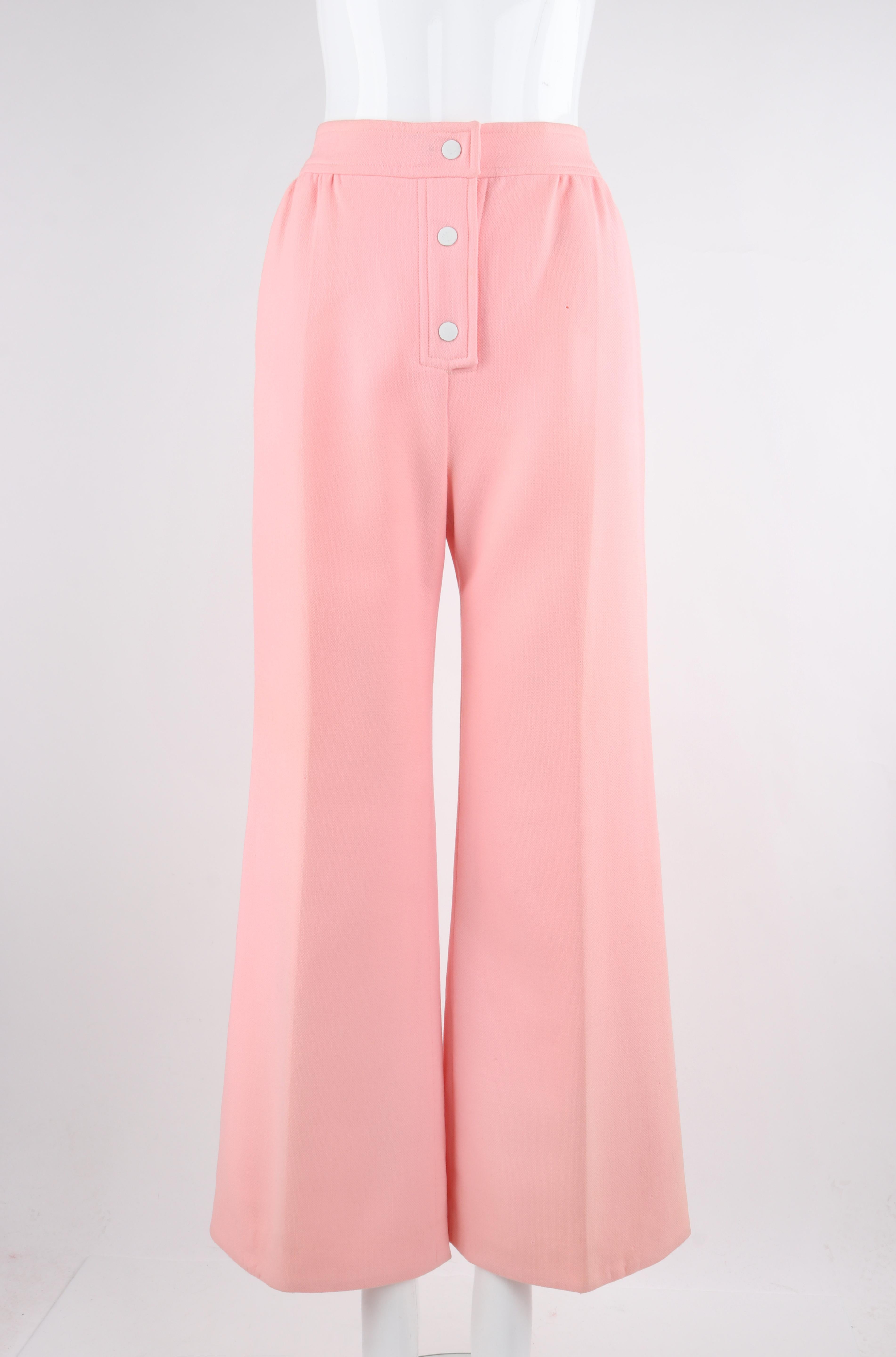 COURREGES Hyperbole c.1970's Vtg Pink Wool High Rise Wide Leg Trouser Pants

Brand / Manufacturer: Courreges
Circa: 1970's
Designer: Andre Courreges
Style: Wide Leg Pants
Color(s): Pink (fabric), White (snaps)
Lined: Yes
Marked Fabric: 
