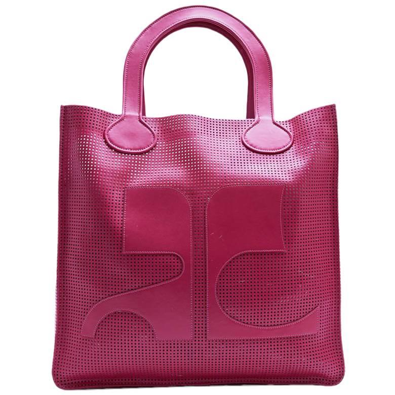 COURREGES Grand fourre-tout en cuir perforé rose