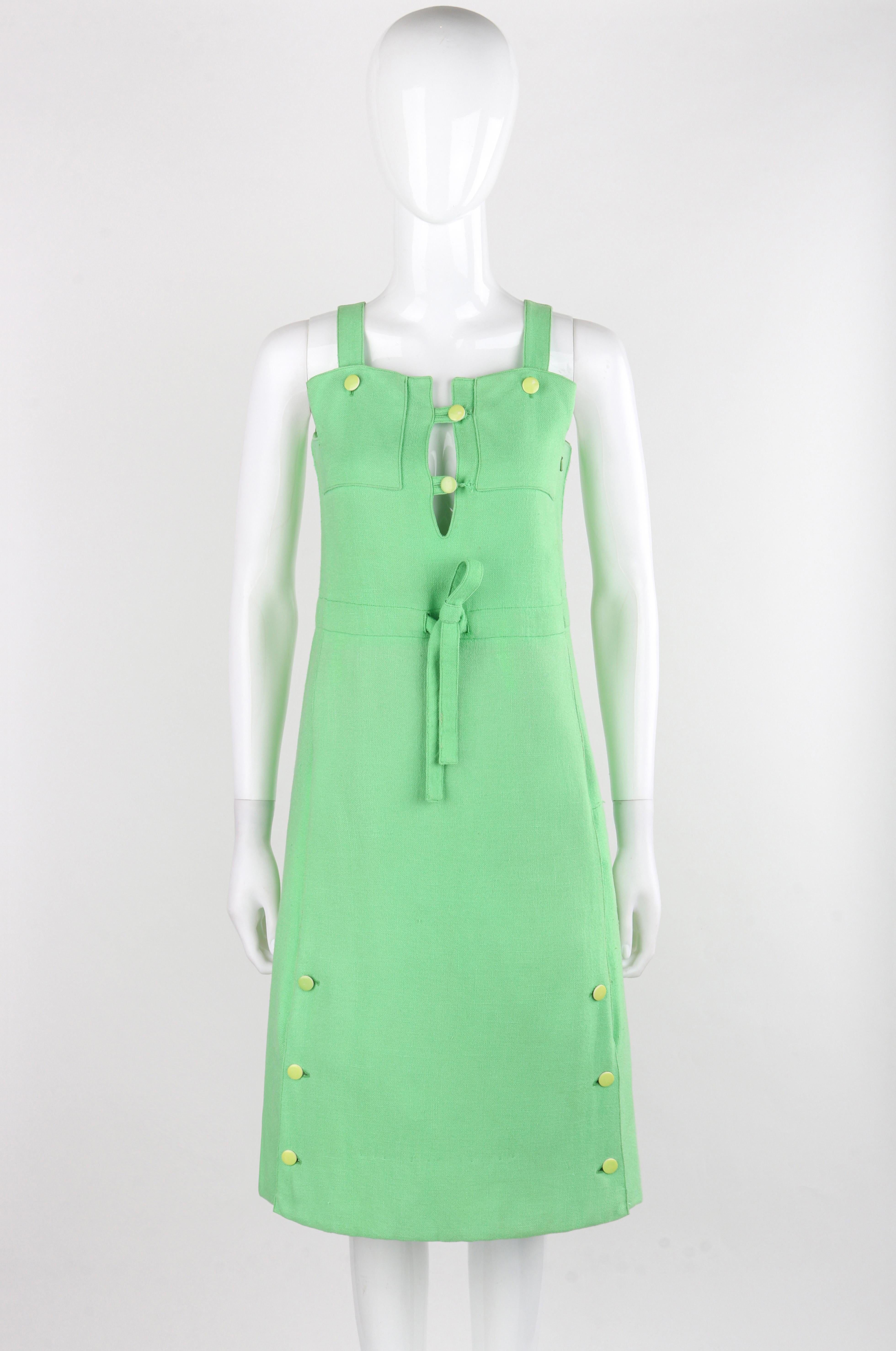 COURREGES Paris c.1960's Vtg Mint Green Tie Front Overall Midi Day Dress

Brand / Manufacturer: Courreges Paris
Circa: 1960's
Designer: Andre Courreges
Style: Overall Day Dress
Color(s): Green (exterior), White (interior)
Lined: Yes
Marked Fabric: