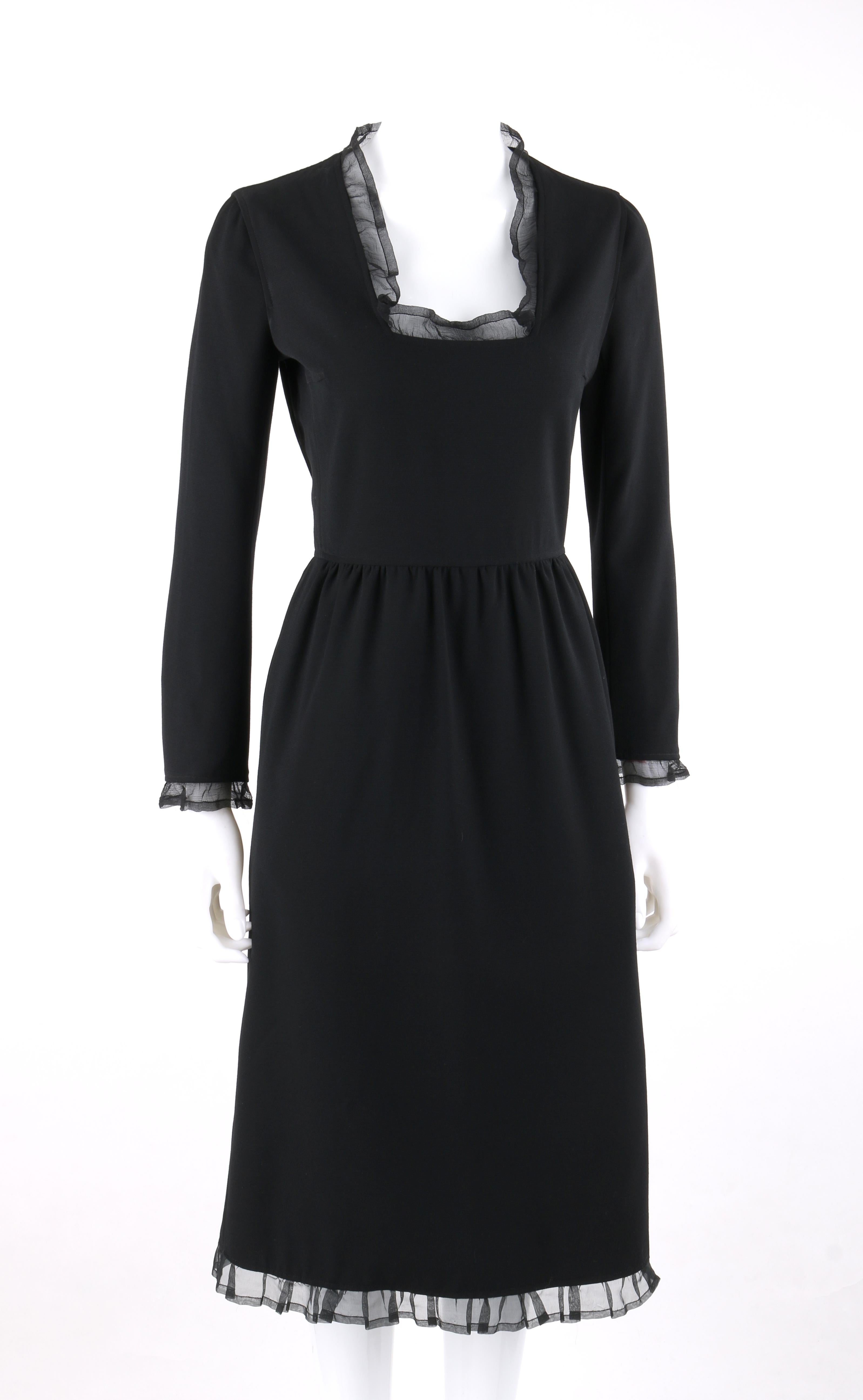 COURREGES c.1970's Black Silk Ruffle Square Scoop Neck Midi Dress
 
Circa: 1970’s-1980's
Label(s): Courreges Paris
Designer: Andre Courreges
Style: Midi dress
Color(s): Black (exterior, interior)
Lined: Yes
Marked Fabric Content: “100% wool