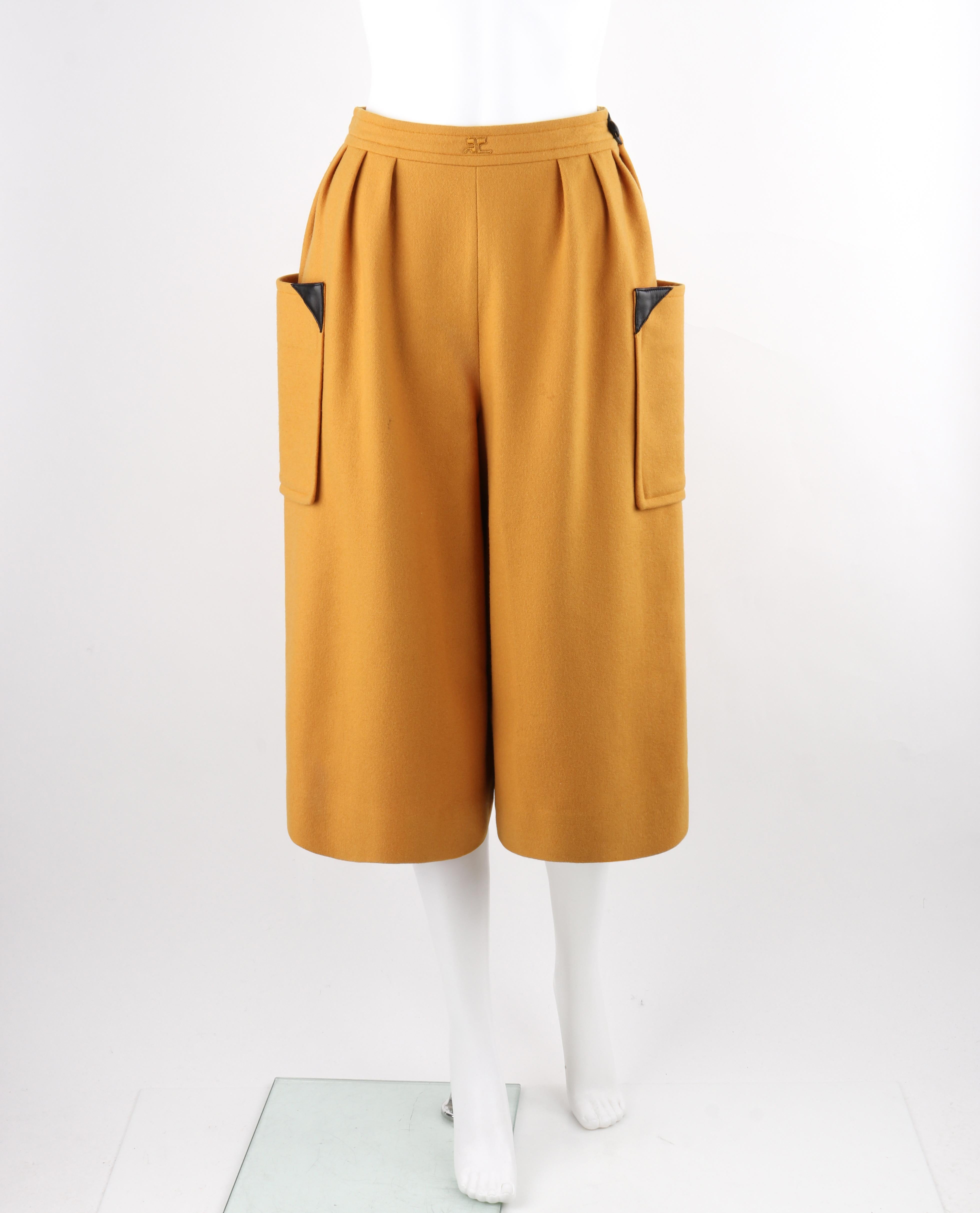 COURREGES PARIS c.1980's Vtg Yellow Wool Cashmere Pleated Wide Leg Capri Pants

Brand / Manufacturer: Courreges Paris
Circa: 1980's
Designer: Andre Courreges
Style: Capri Pants
Color(s): Yellow, Black
Lined: Yes
Marked Fabric: 