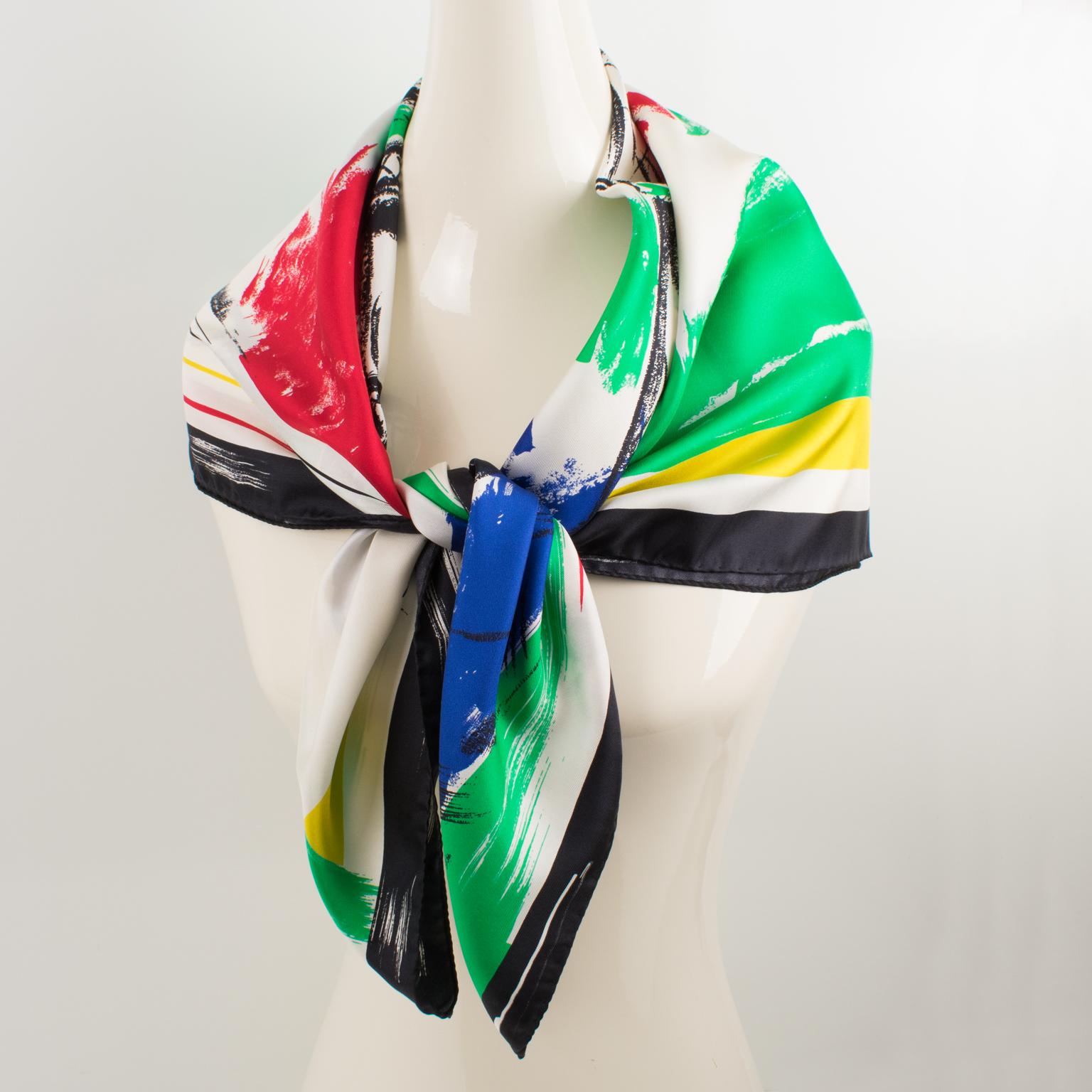 This beautiful silk scarf by Courreges in multicolor tones features the iconic Eiffel Tower design print. The signature on the bottom right corner reads 