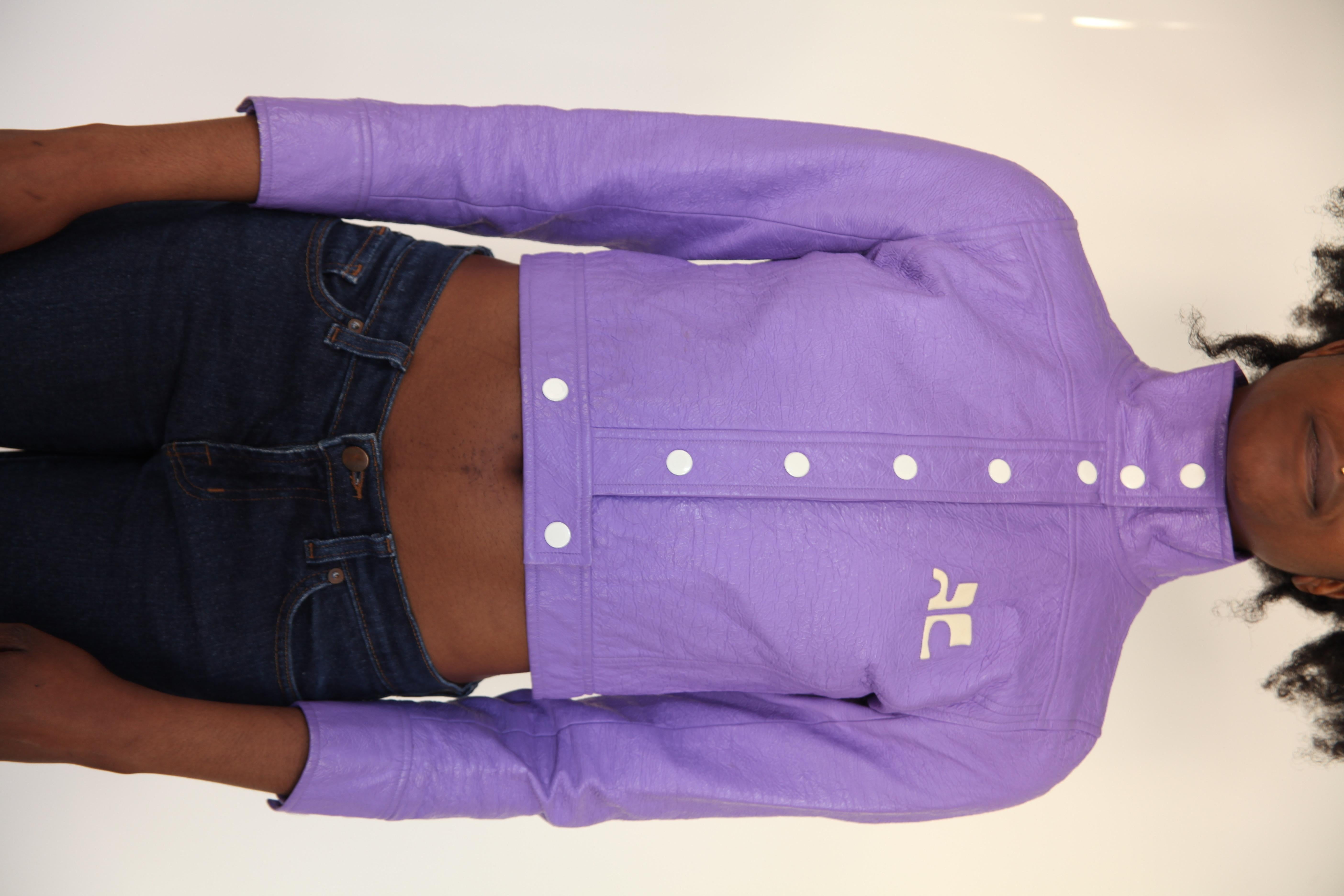 This lavender vinyl mod jacket an undeniable piece of fashion history from the iconic French designer. The piece not only encapsulates the youthful spirit of the time, celebrating the effervescent and modernity of 1960s but it also shows a design