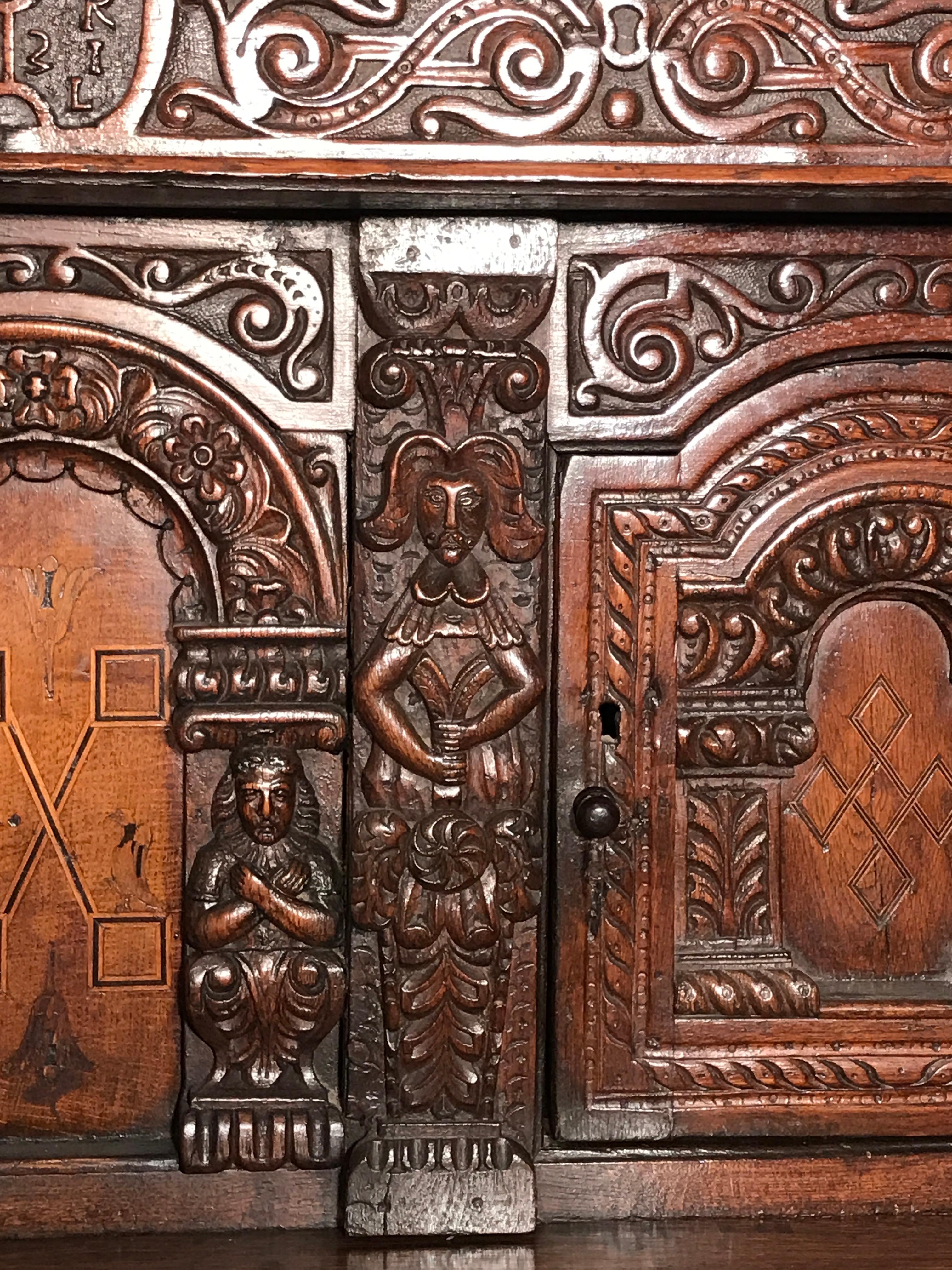 18th Century and Earlier Court Cupboard Dated 1731 Initialled RR KL Inlaid Oak Fruitwood Masks For Sale