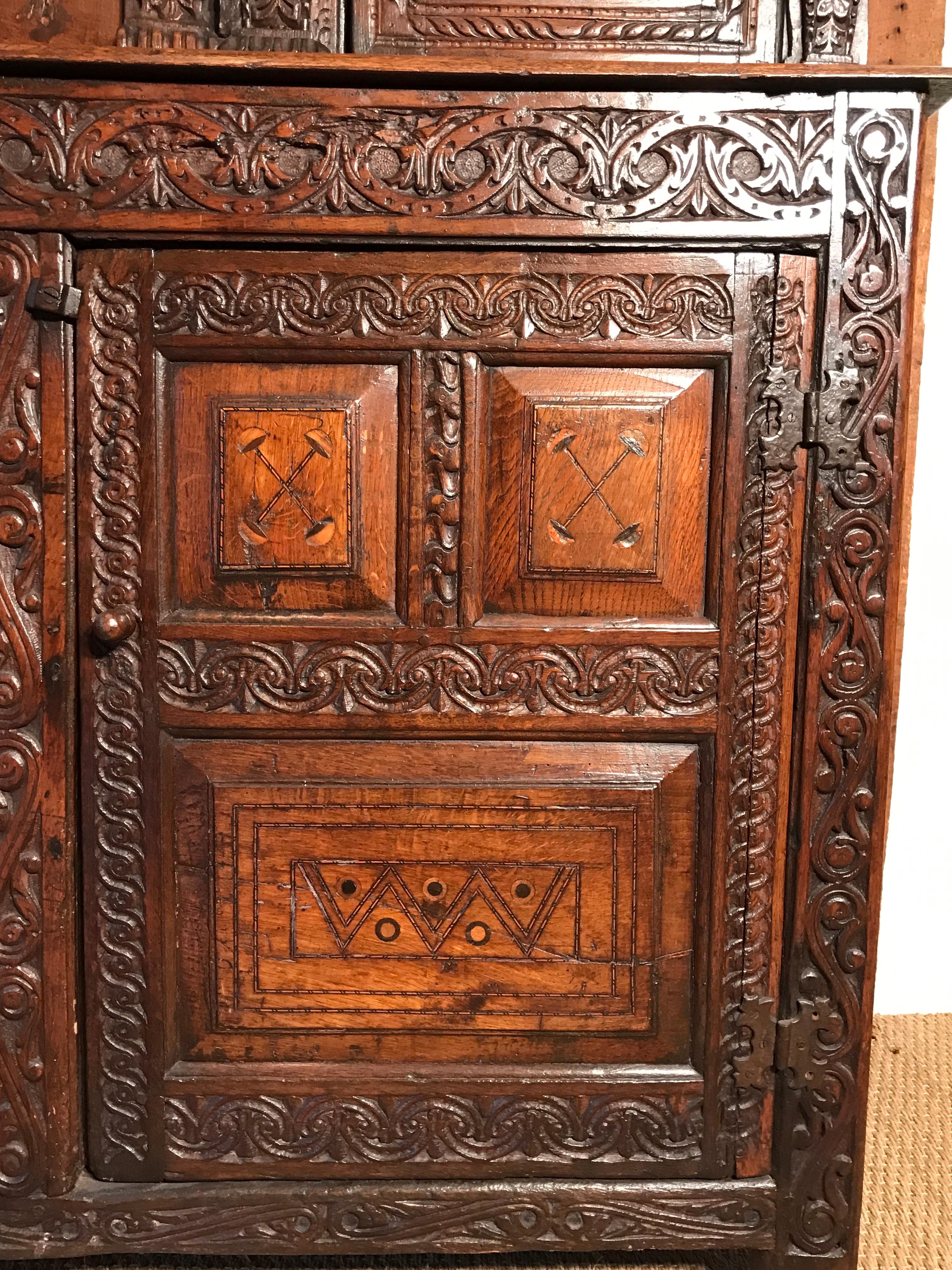 Court Cupboard Dated 1731 Initialled RR KL Inlaid Oak Fruitwood Masks For Sale 1