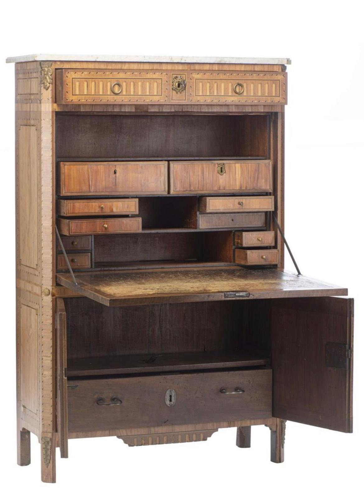 Louis XVI period secretary, late 18 century, made in Dijon, by Courte Jean-Baptiste (1749-1843) the secretary is stamped COURTE for Courte Jean Baptiste master in Dijon from 1777. 

The secretary has a white marble top, cut corners, bronze inlay