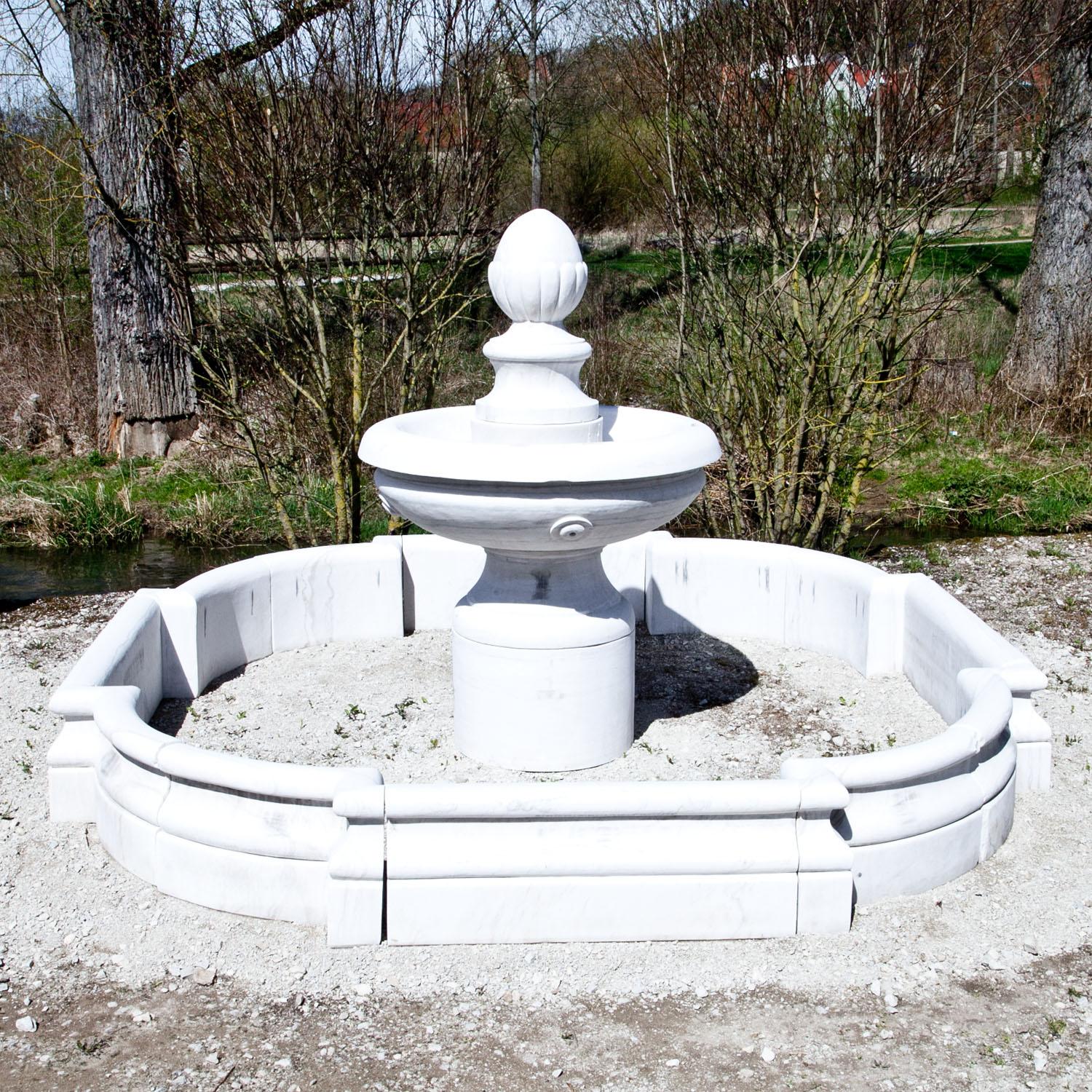 The large yard fountain is carved out of white marble in the classical style. The fountain feature stands on a cylindrical pedestal. The pool has a height of 41 and a diameter of 290cm. The column 180cm has a diameter of 110 cm. The projecting basin