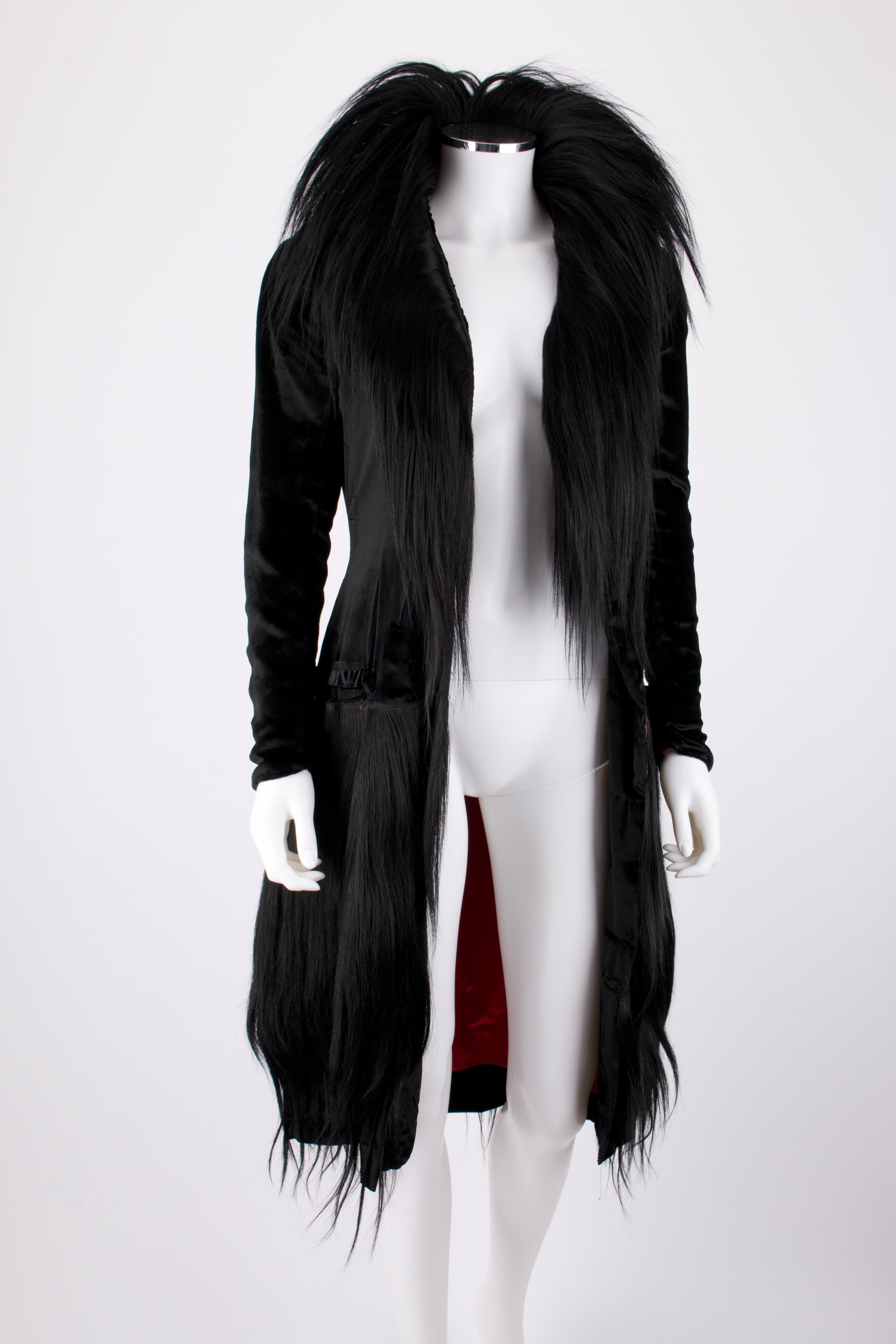 COUTURE c.1920's Black Long Fur Silk Velvet Avant Garde Flapper Coat OOAK

Circa: 1920’s
Style: Coat 
Color(s): Black (exterior); red (interior)
Lined: Yes
Unmarked Fabric Content (feel of): Genuine fur (trim/detail), velvet (exterior); satin