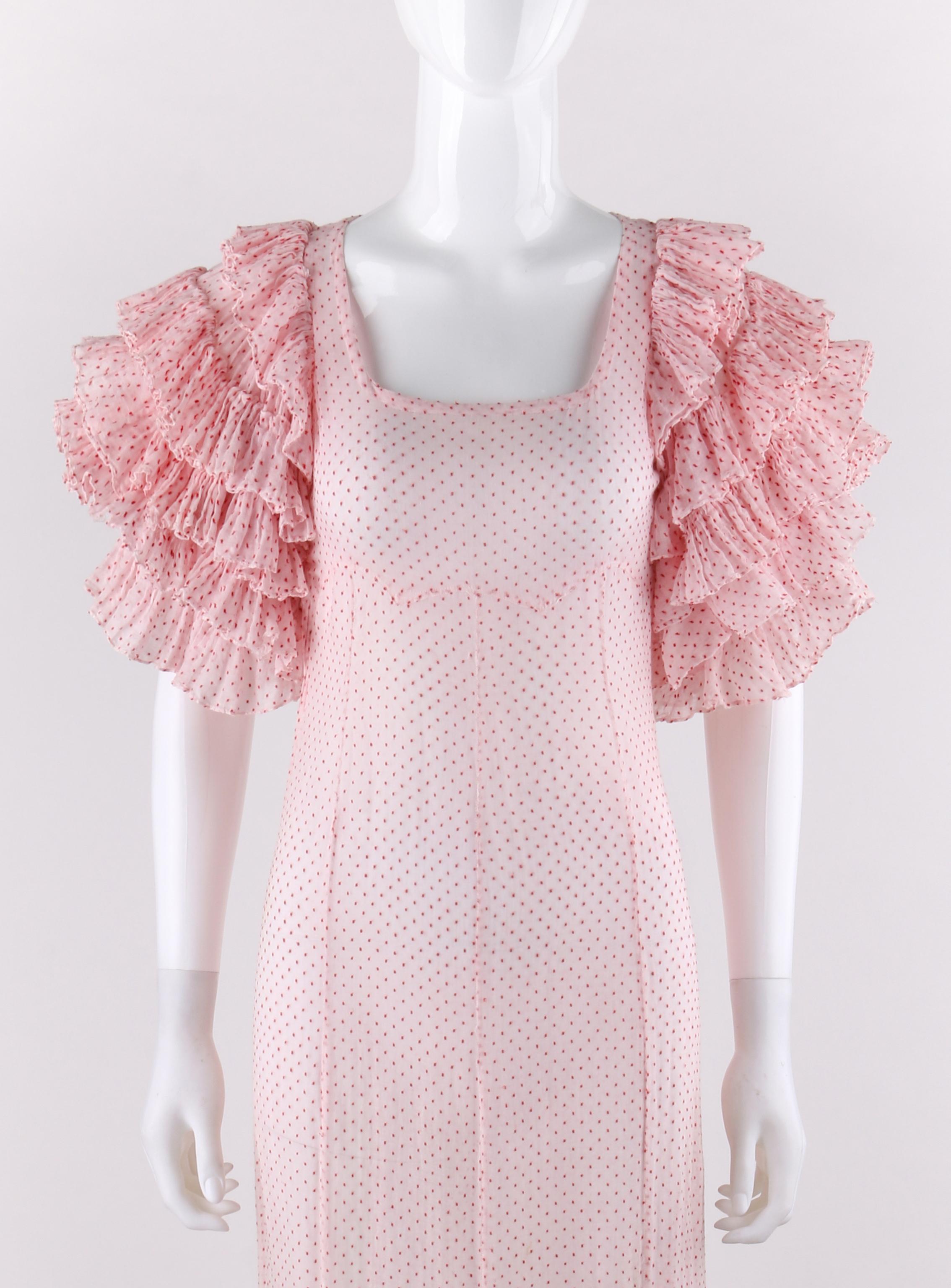 COUTURE c.1930's Pink Swiss Dot Dramatic Tiered Ruffle Sleeve Maxi Dress Gown
 
Circa: 1930’s
Style: Maxi dress
Color(s): Shades of pink, red (exterior, interior)
Lined: No
Unmarked Fabric Content: Cotton woven fabric (exterior, interior)
Additional